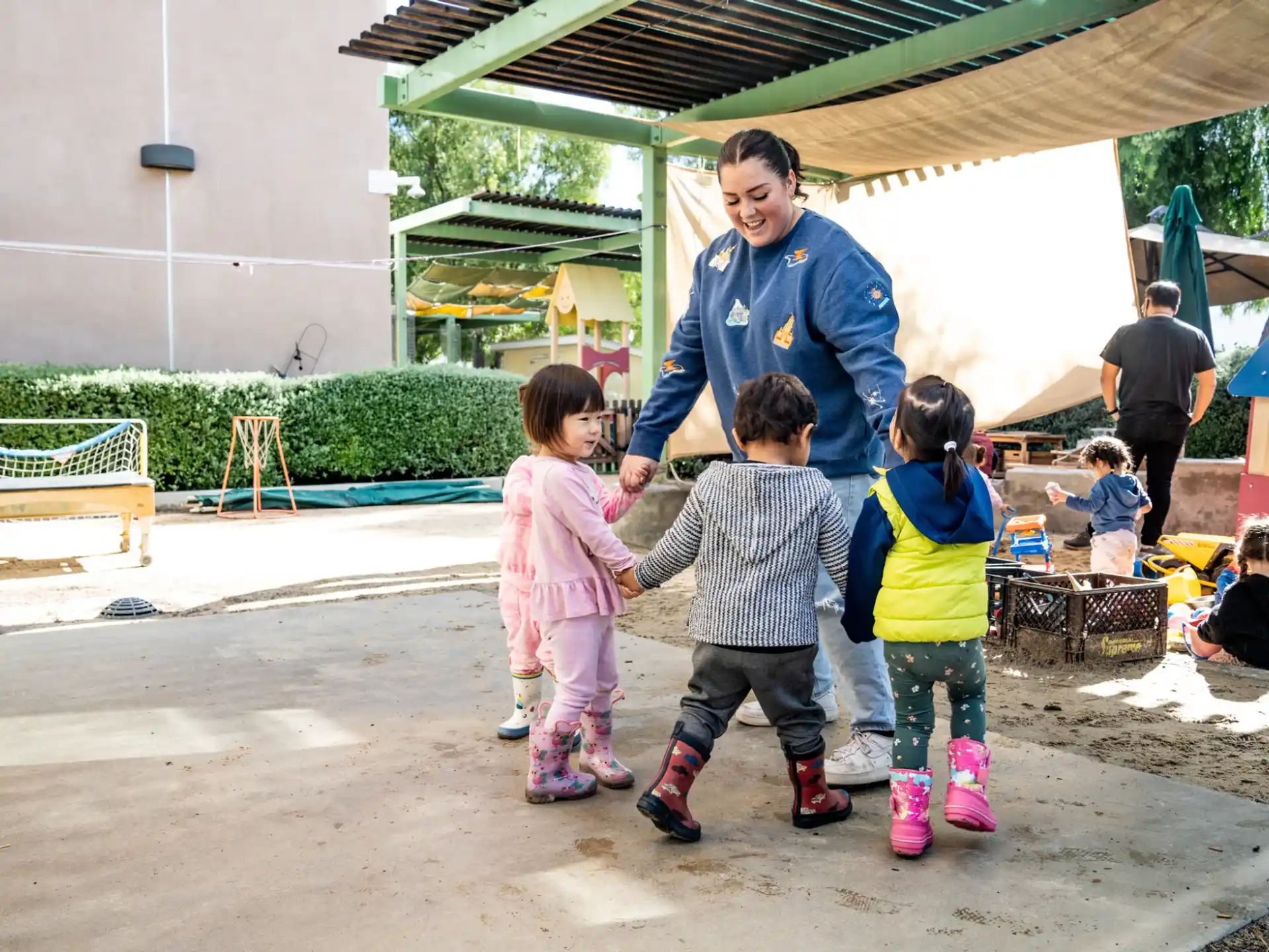 a person and children walking