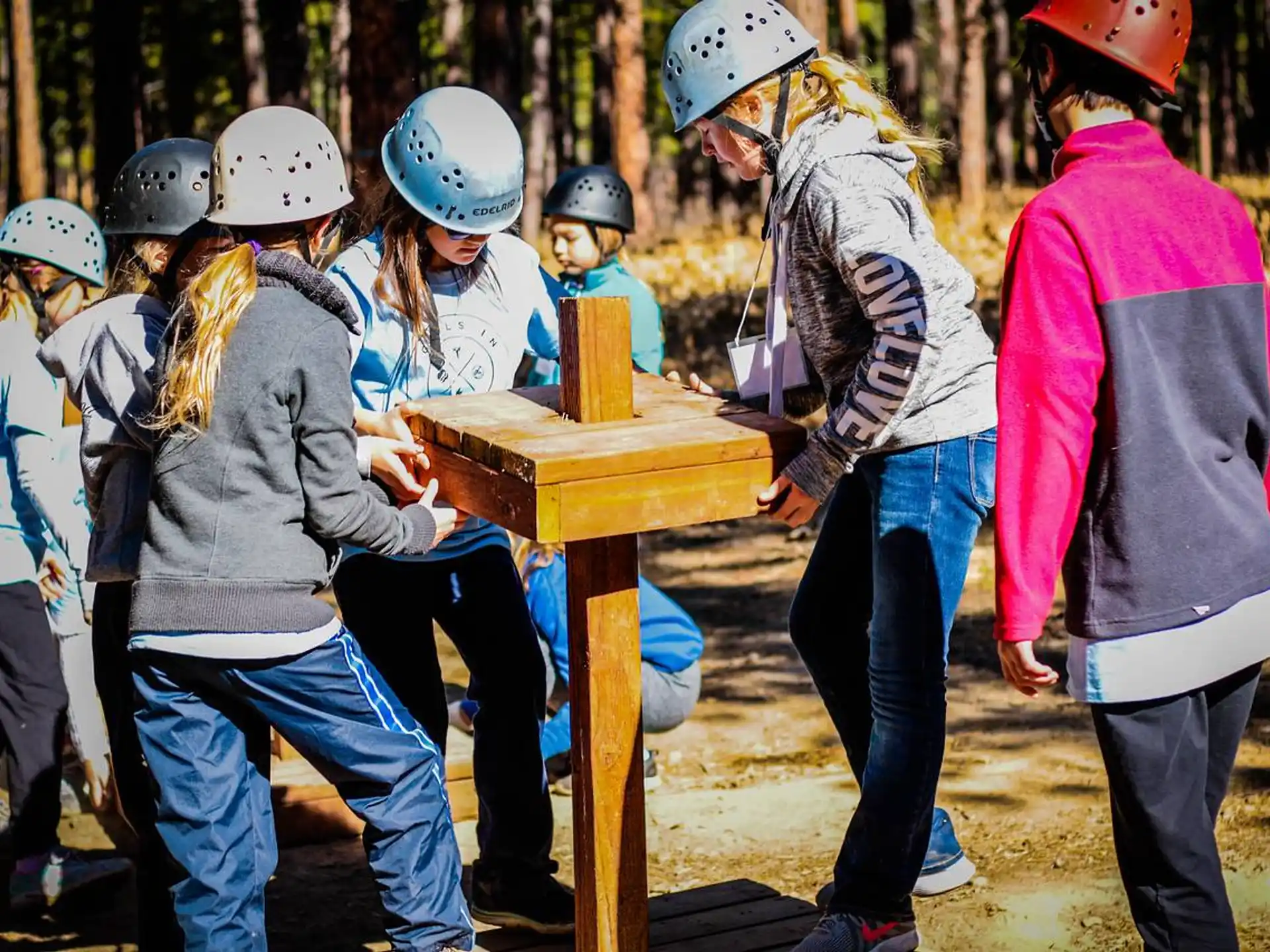 a group of people wearing helmets