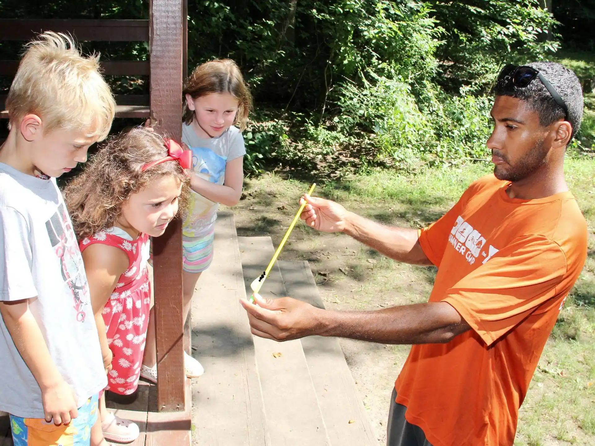a man and a group of children