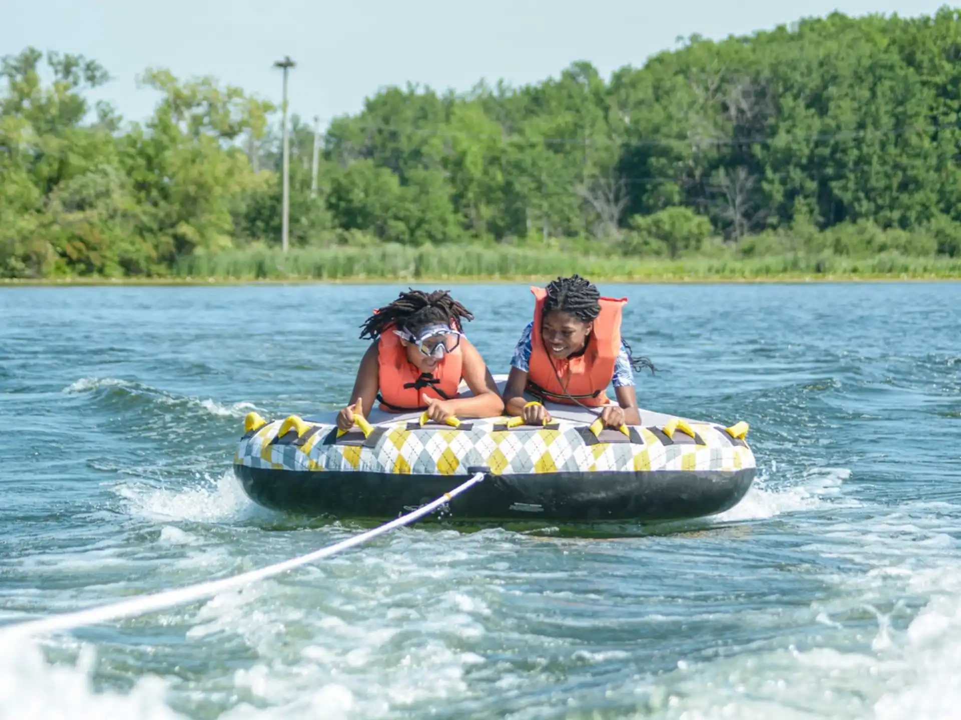 a couple of people in a canoe