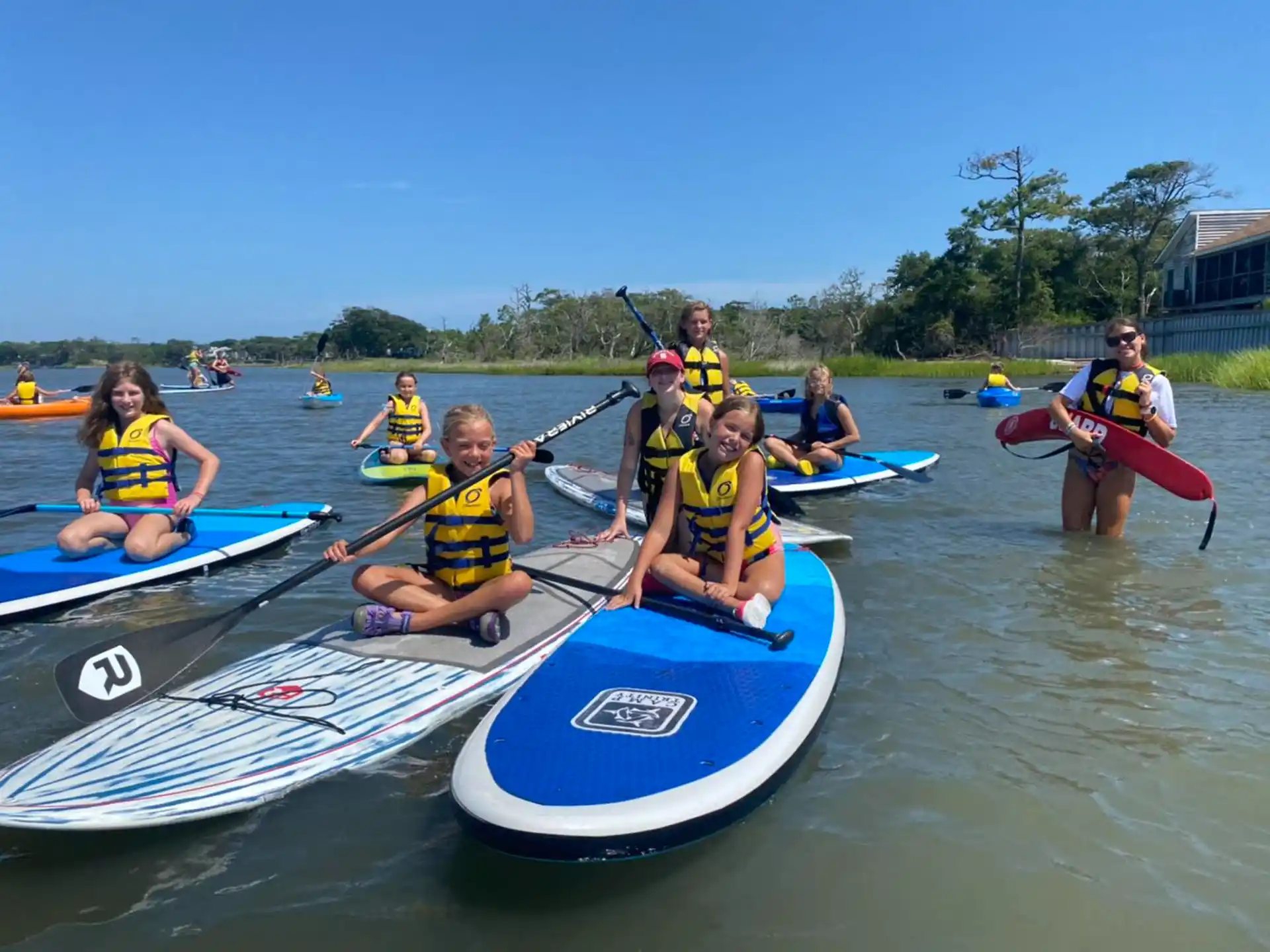 a group of people in kayaks
