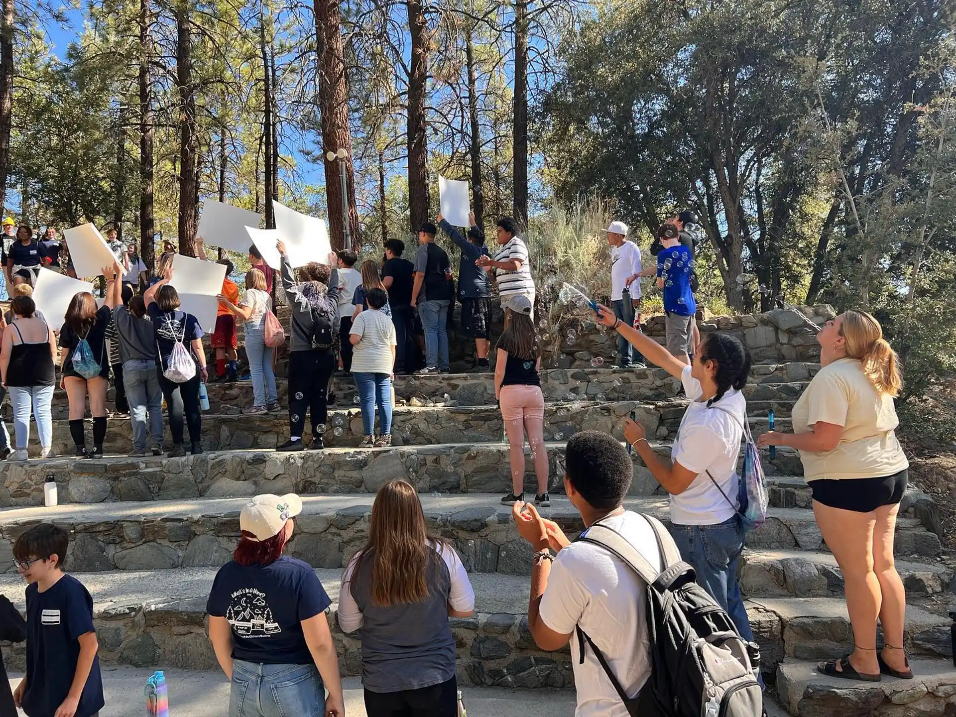 a group of people standing on stairs