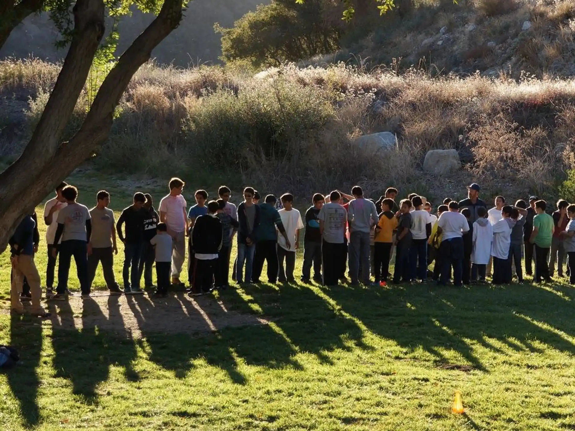 a group of people standing in a line outside