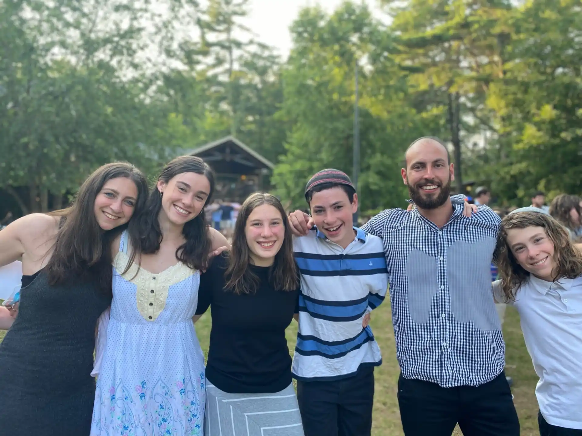 a group of people posing for a photo