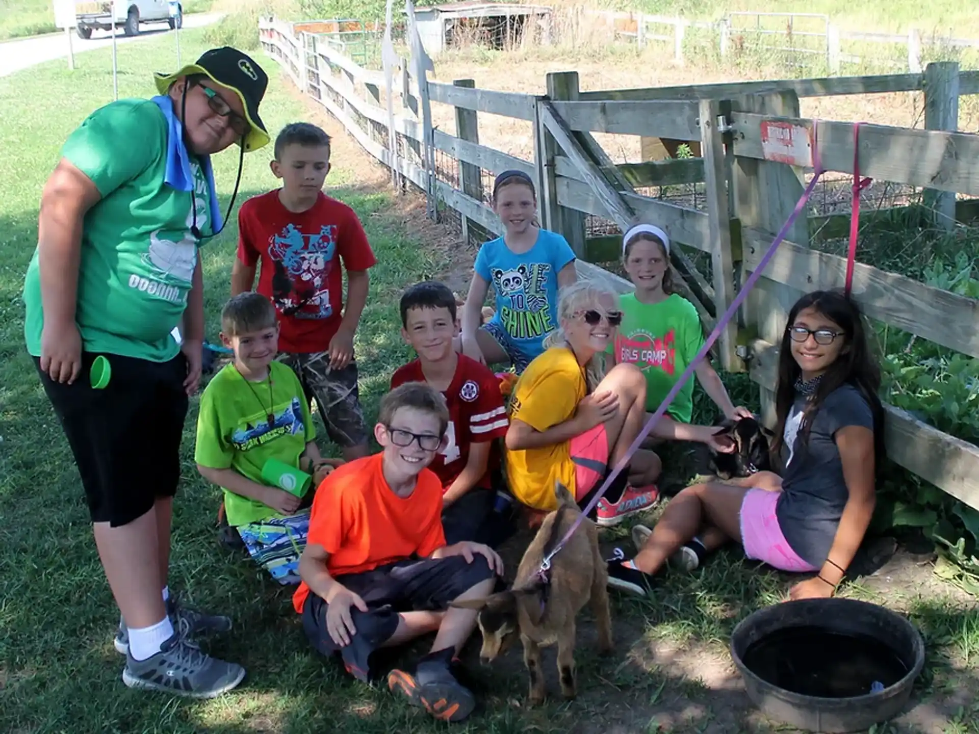 a group of people posing for a photo with a dog