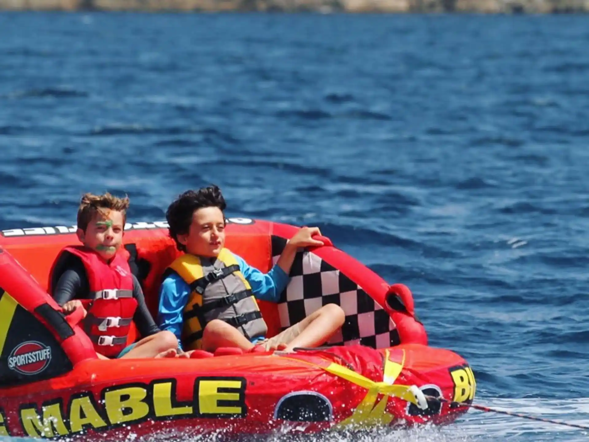 a group of people in a raft