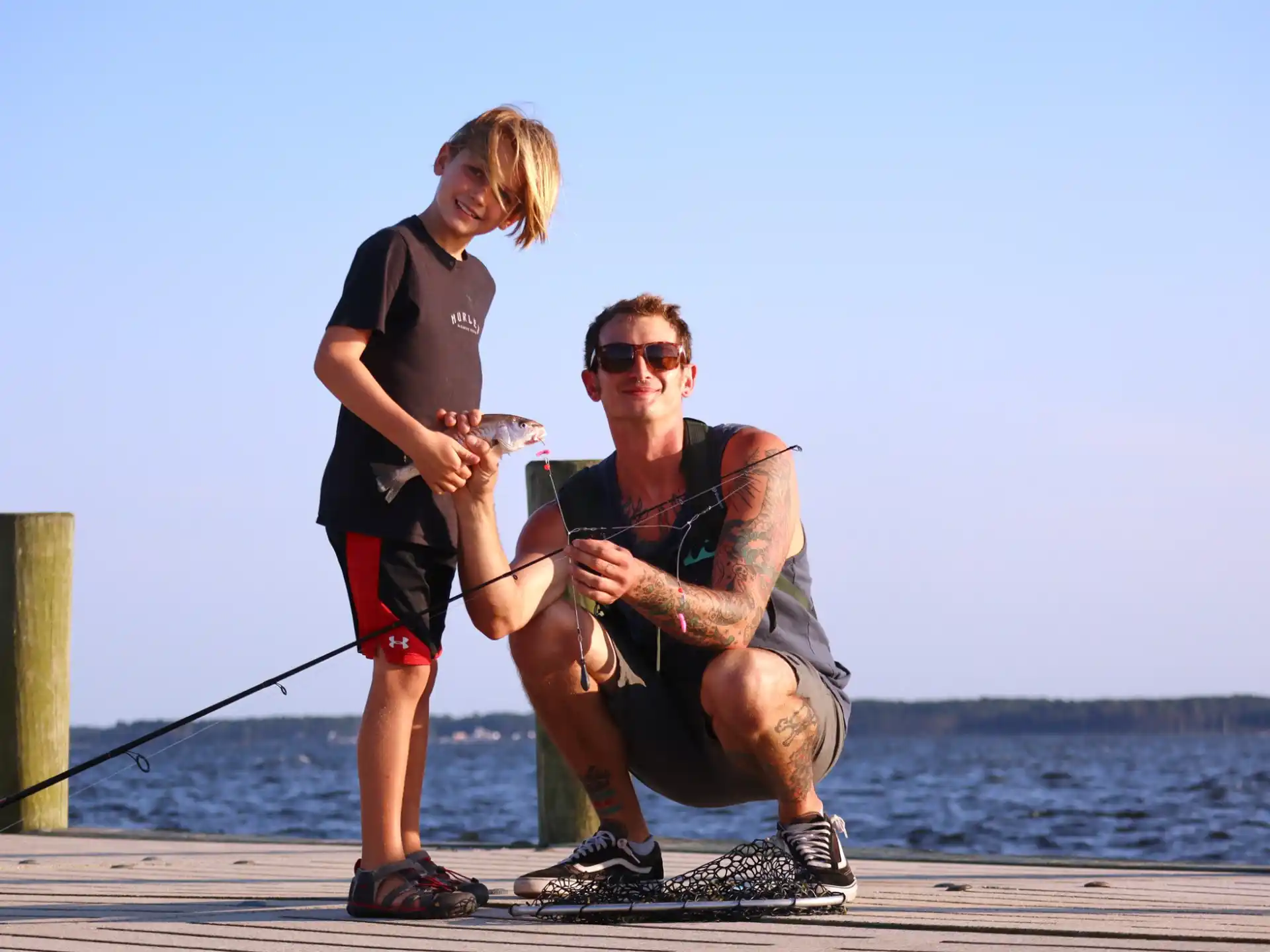 a man and a woman fishing