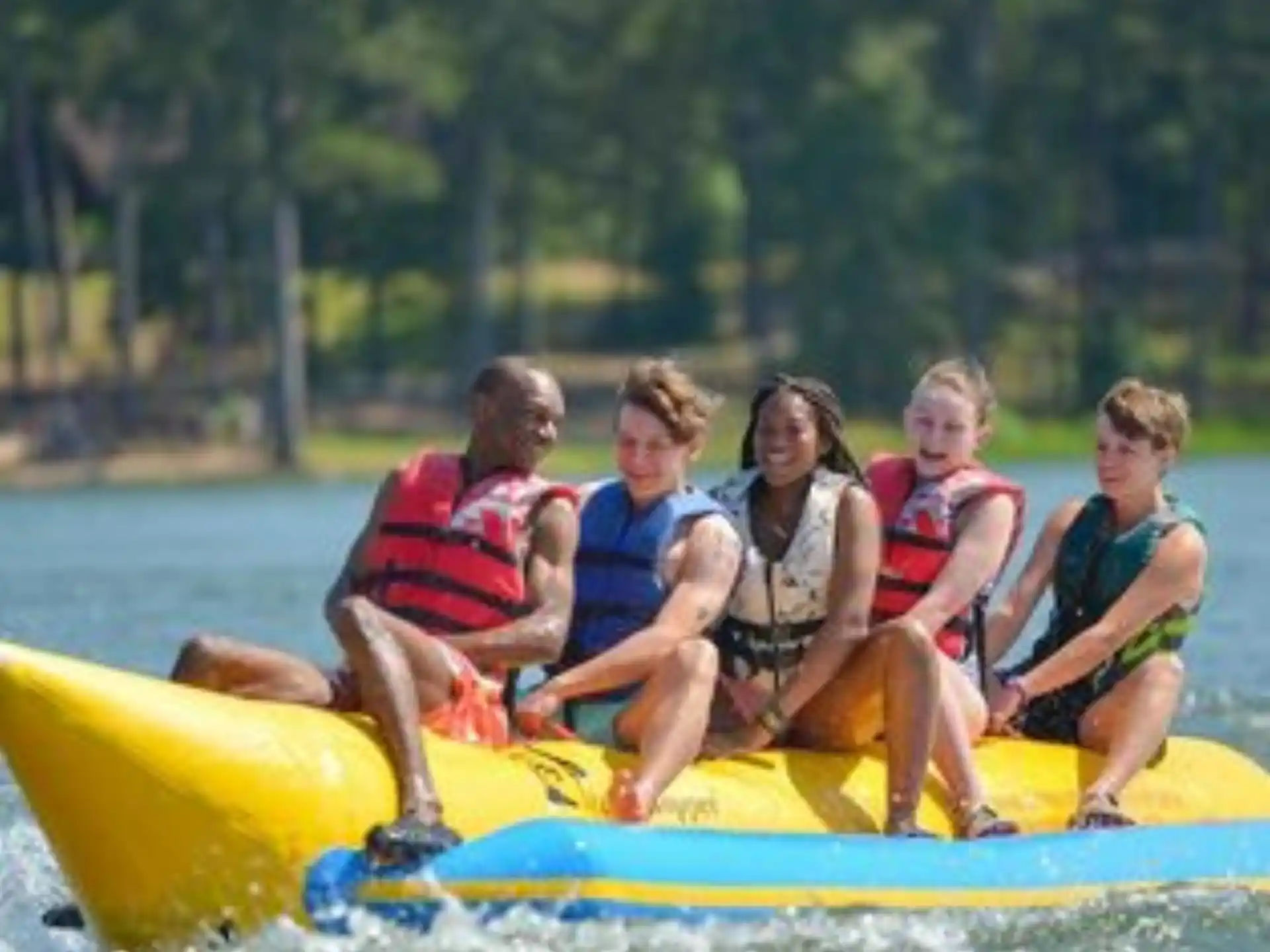 a group of people on a raft