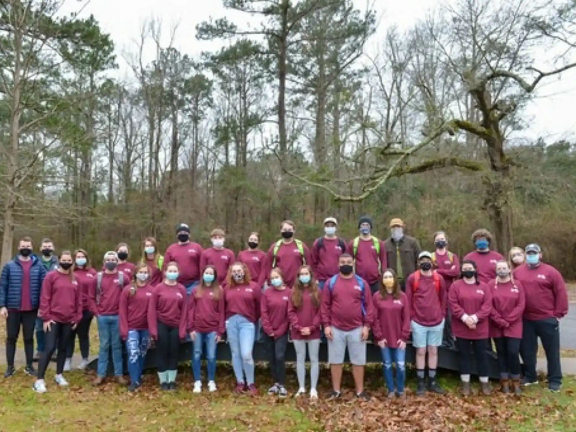a group of people posing for a photo