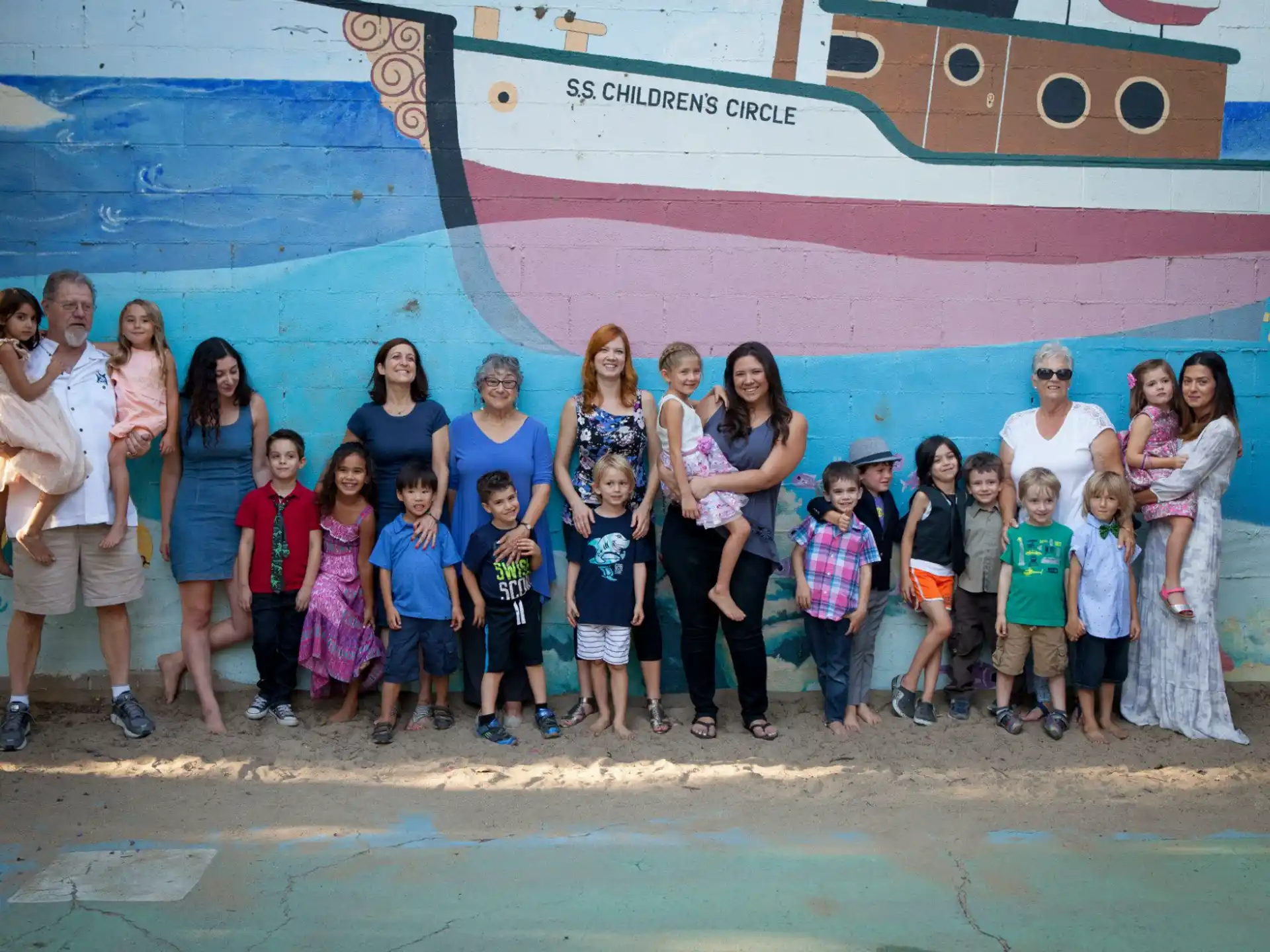 a group of people posing for a photo