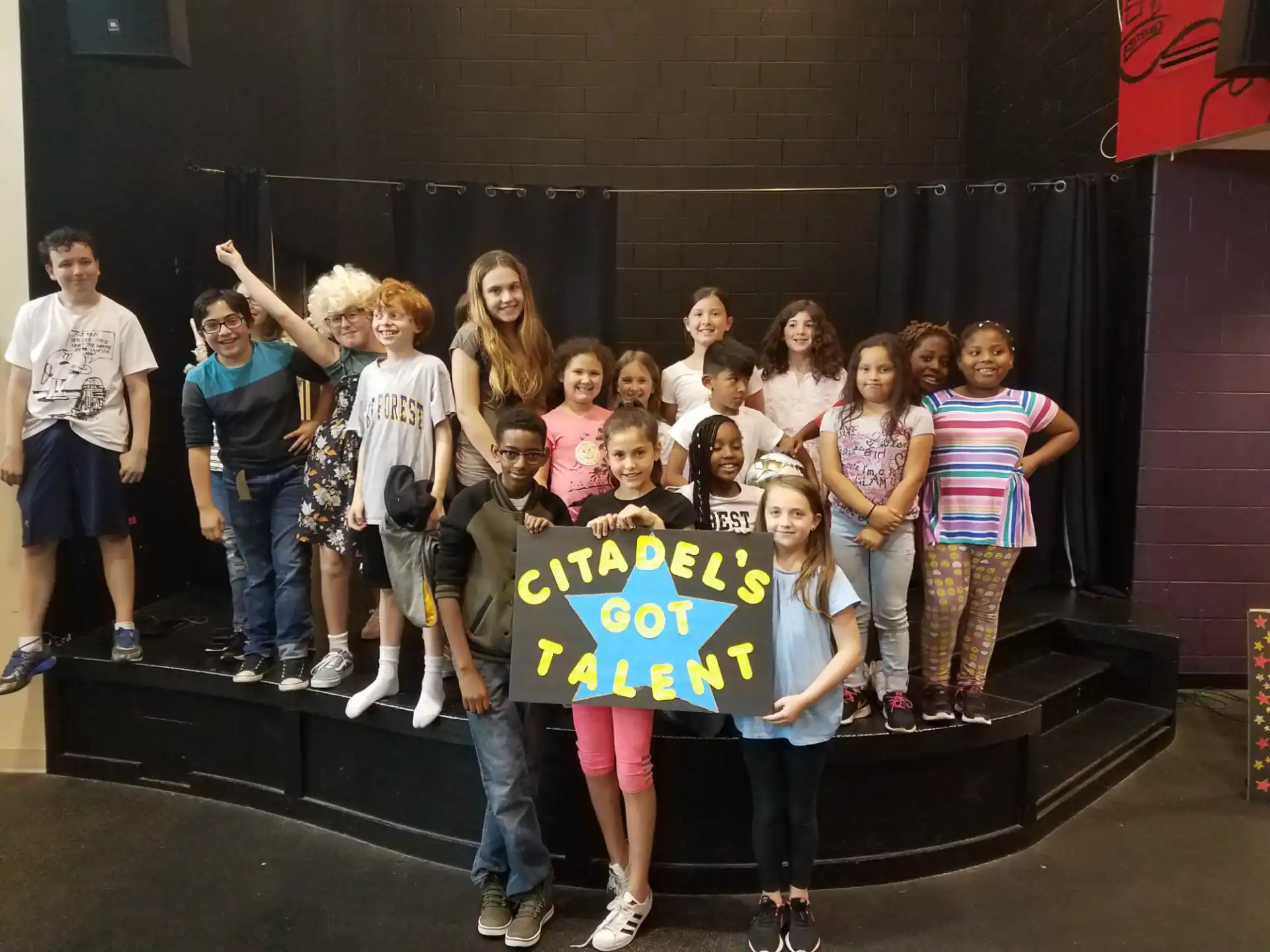 a group of people posing for a photo
