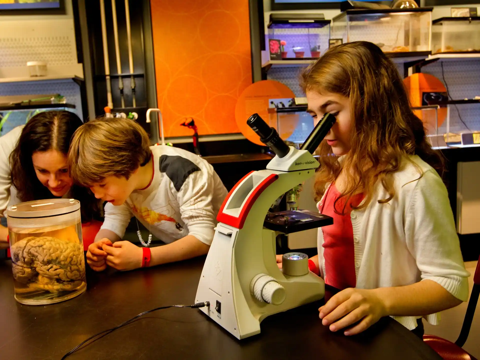 a few children working at a table
