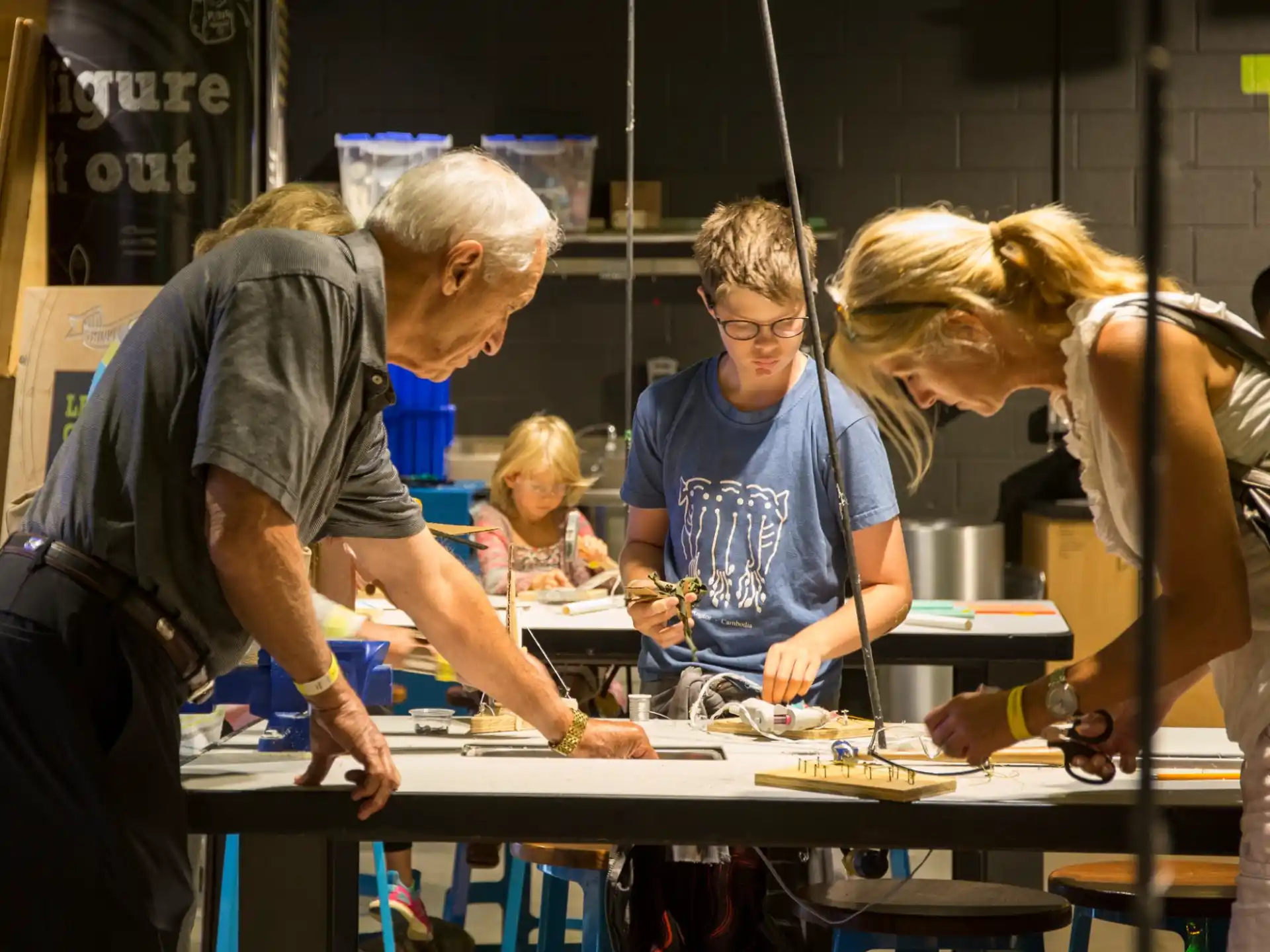a group of people working in a factory