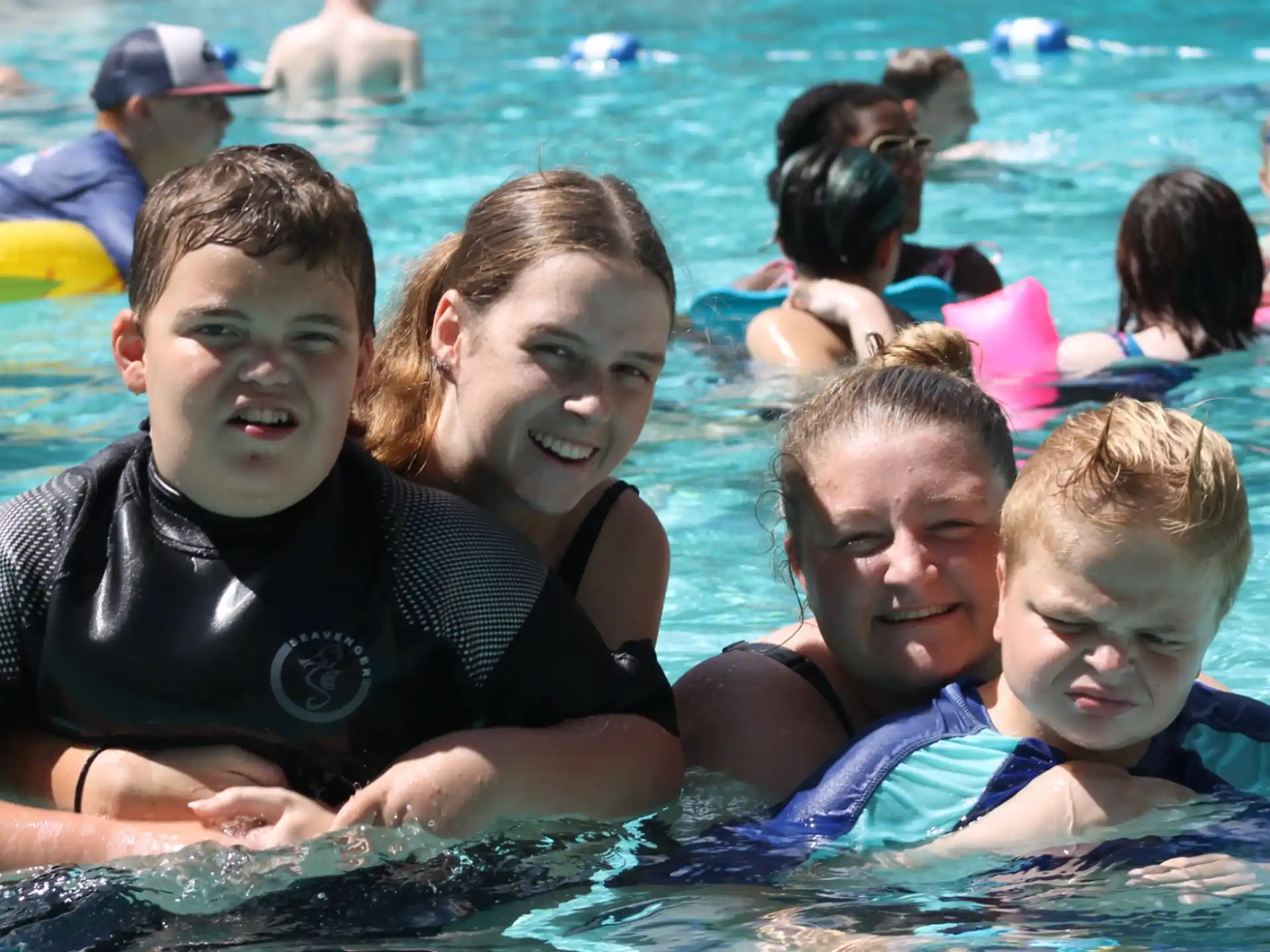 a group of people in a pool