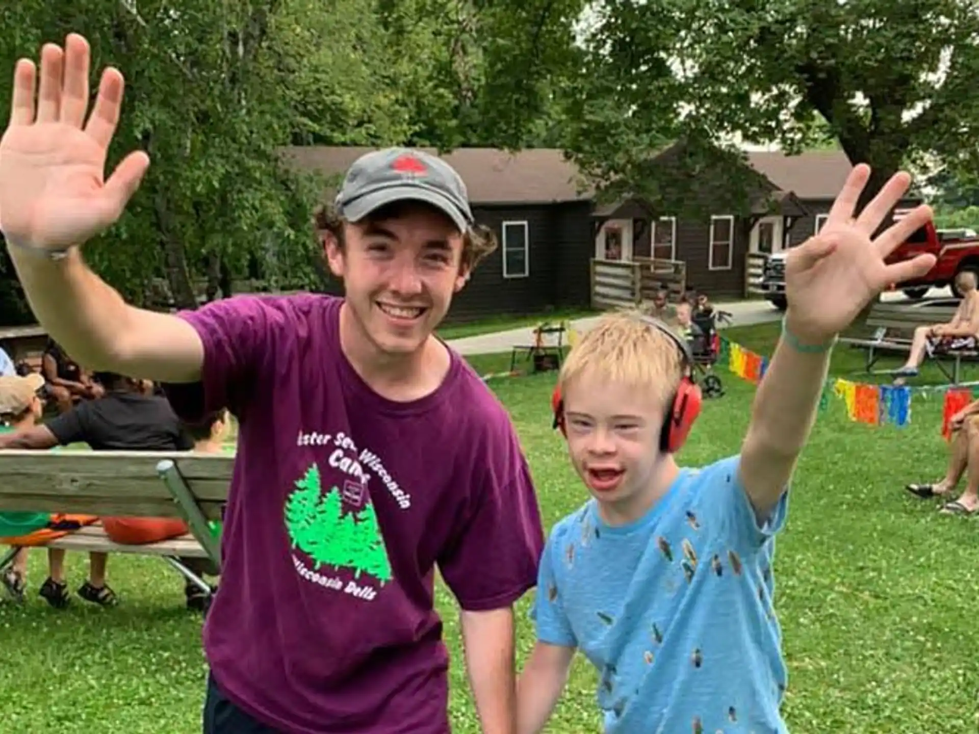 a person and a boy posing for a picture