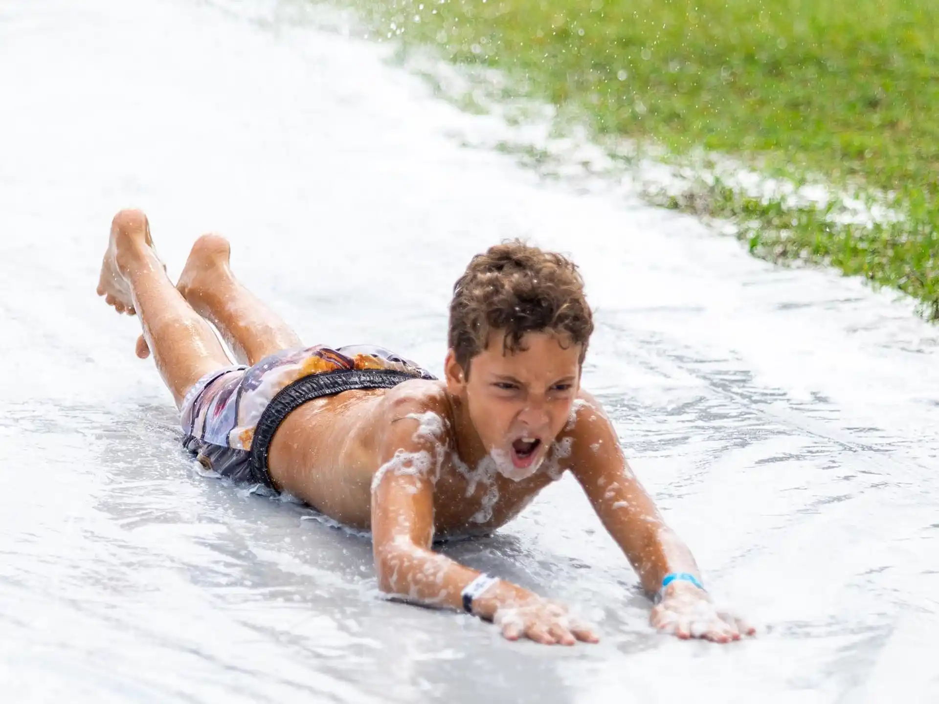 a boy playing in the water