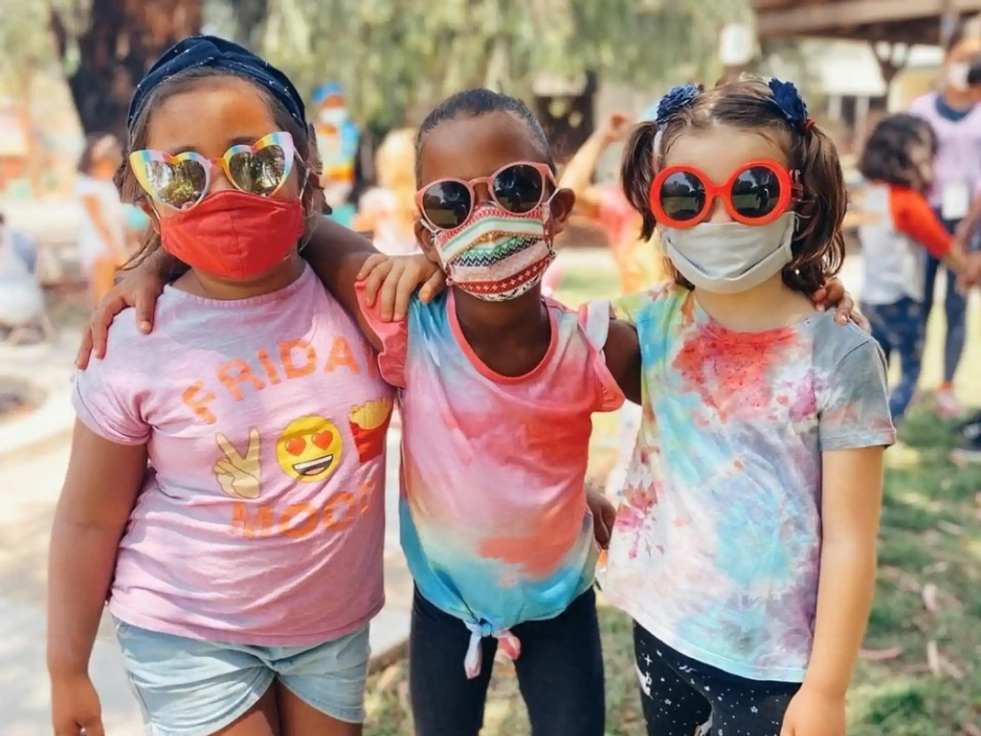 a group of children with face paint