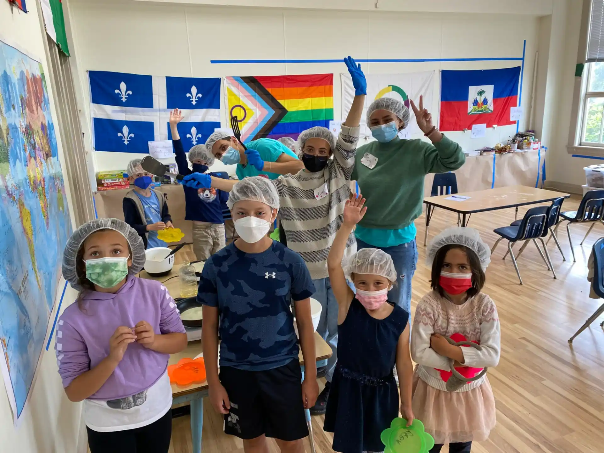 a group of children wearing masks