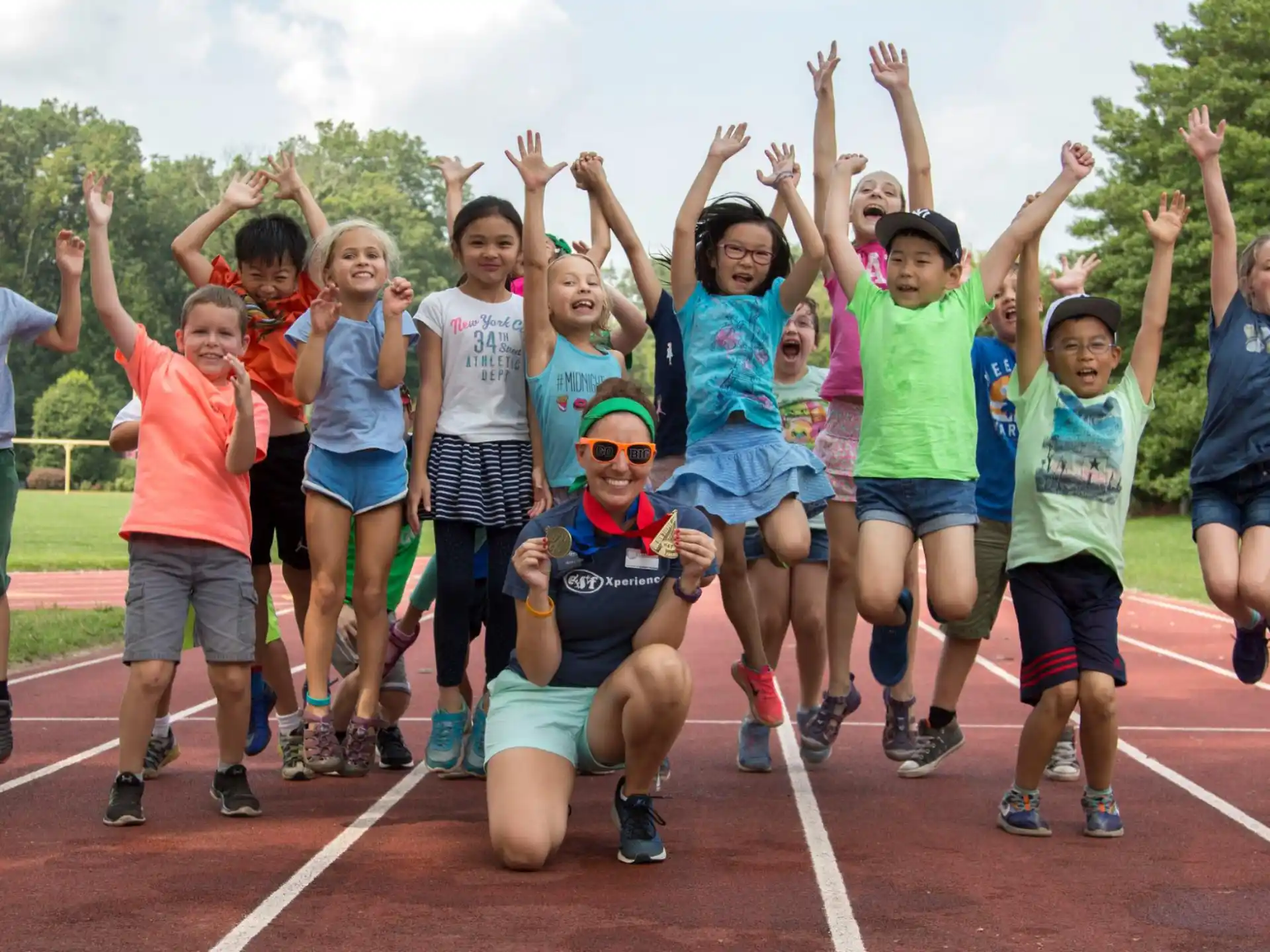 a group of people running on a track