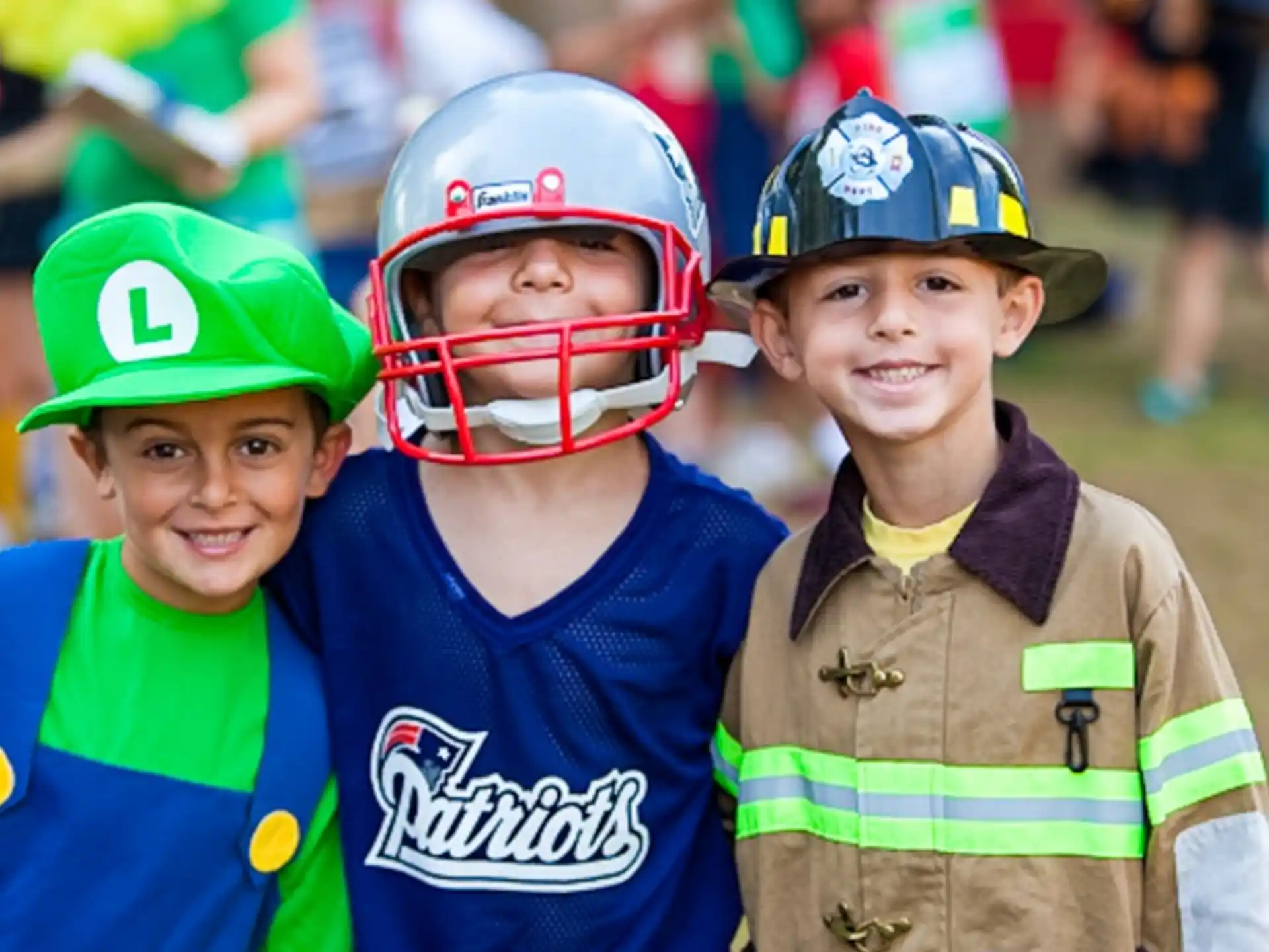 a group of boys wearing helmets