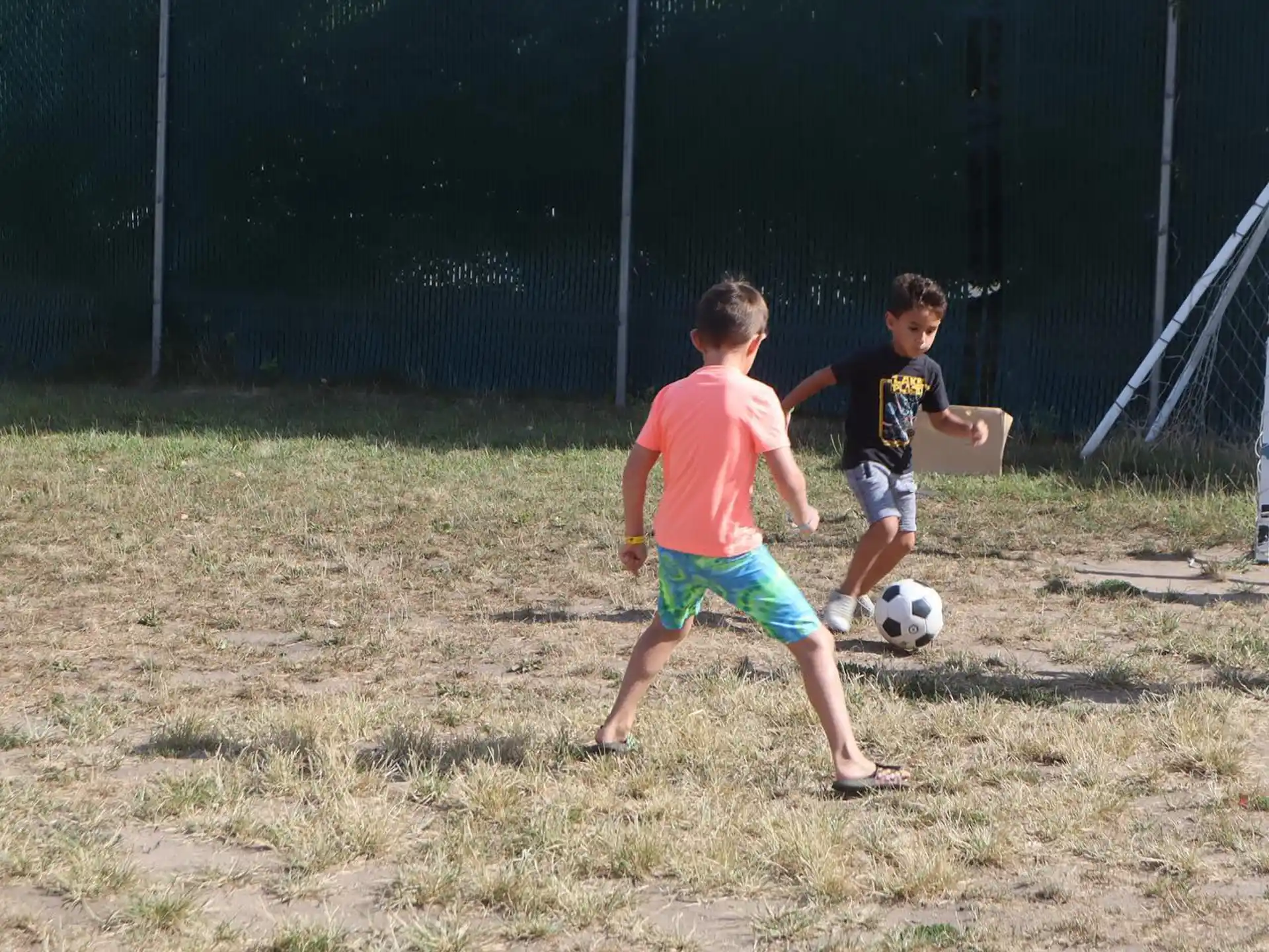 a couple of boys playing football