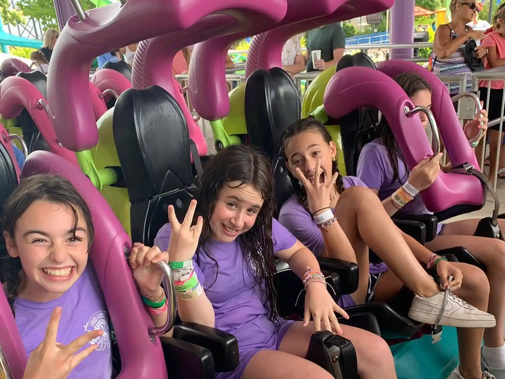 a group of people in a roller coaster