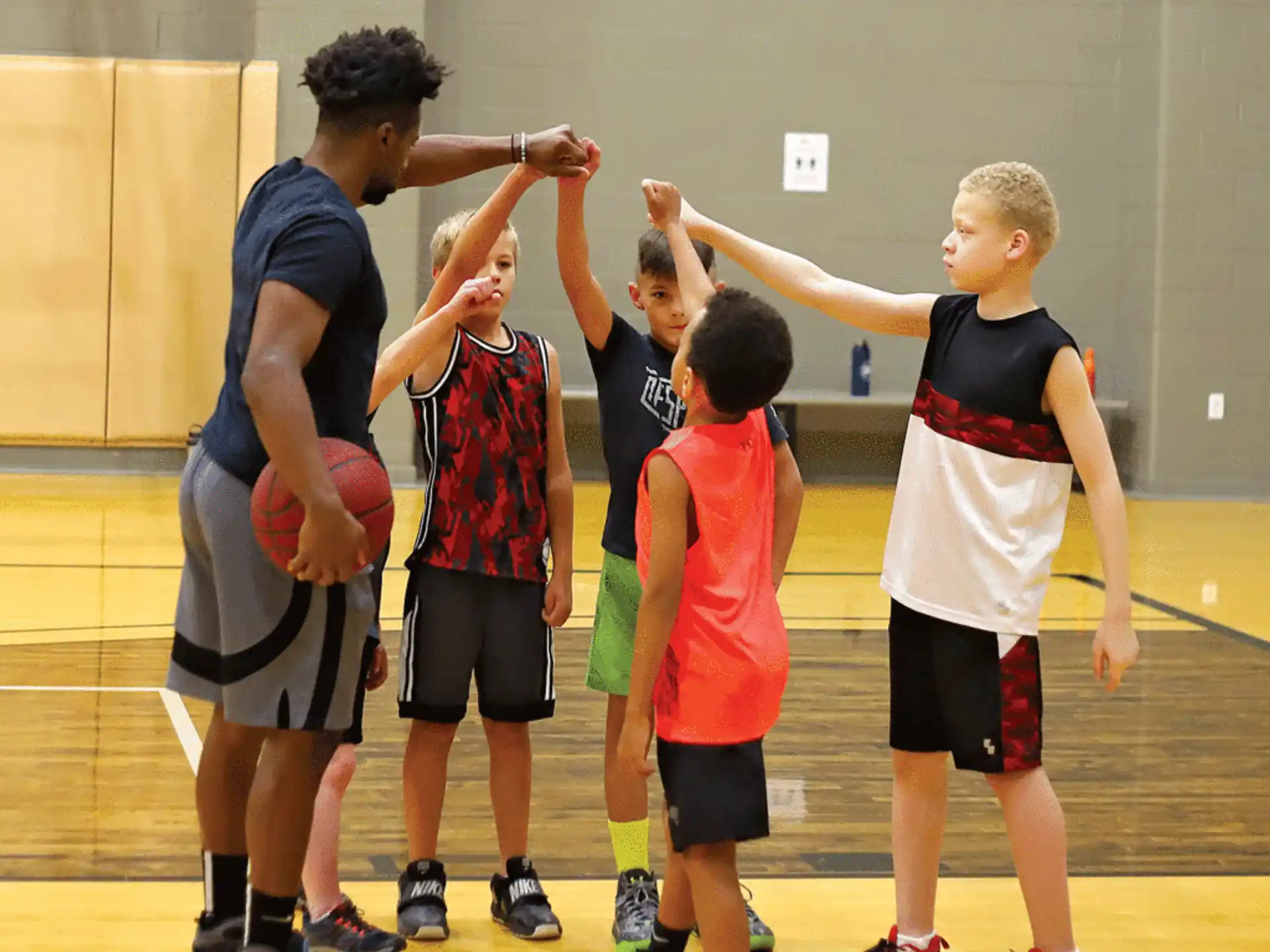 a group of boys in a gym