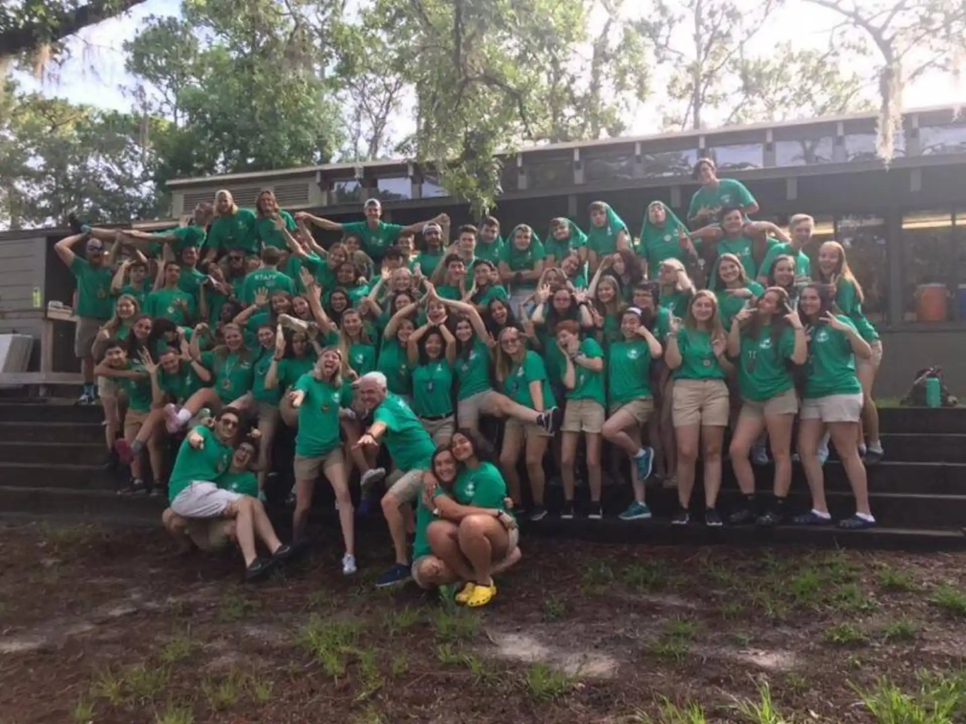 a group of people posing for a photo