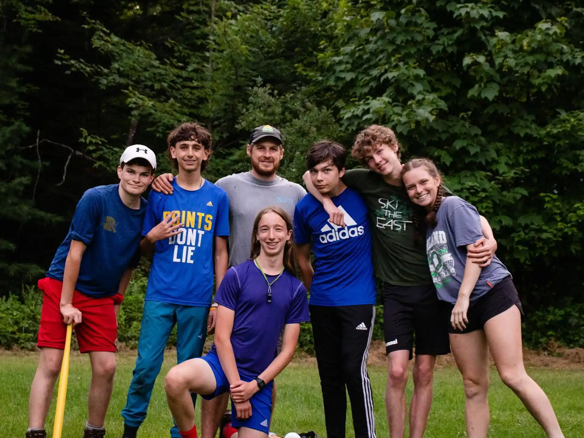 a group of people posing for a photo