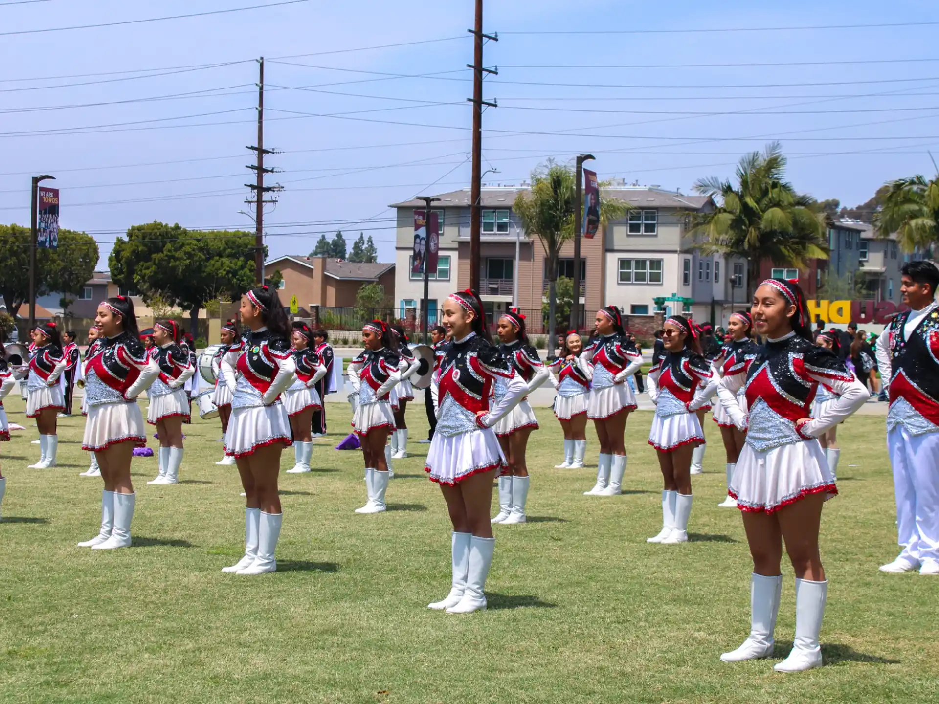 a group of people in a marching band