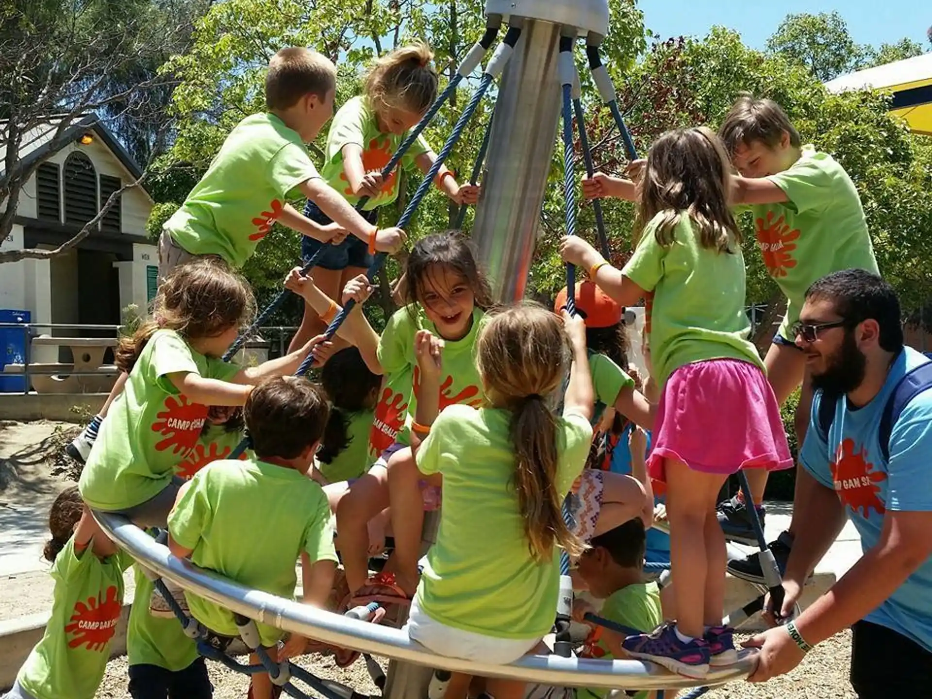a group of people playing with a toy