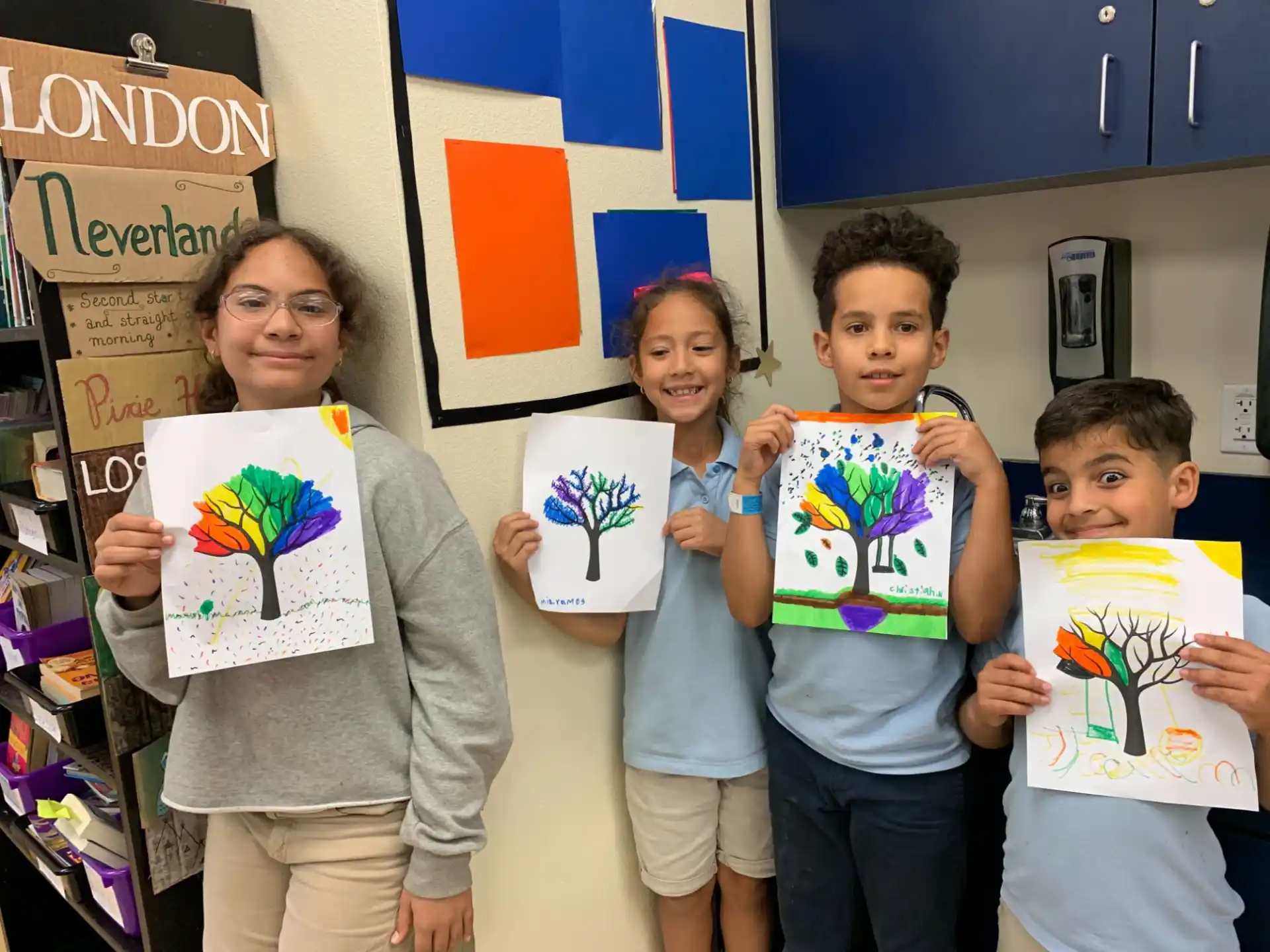 a group of children holding up signs
