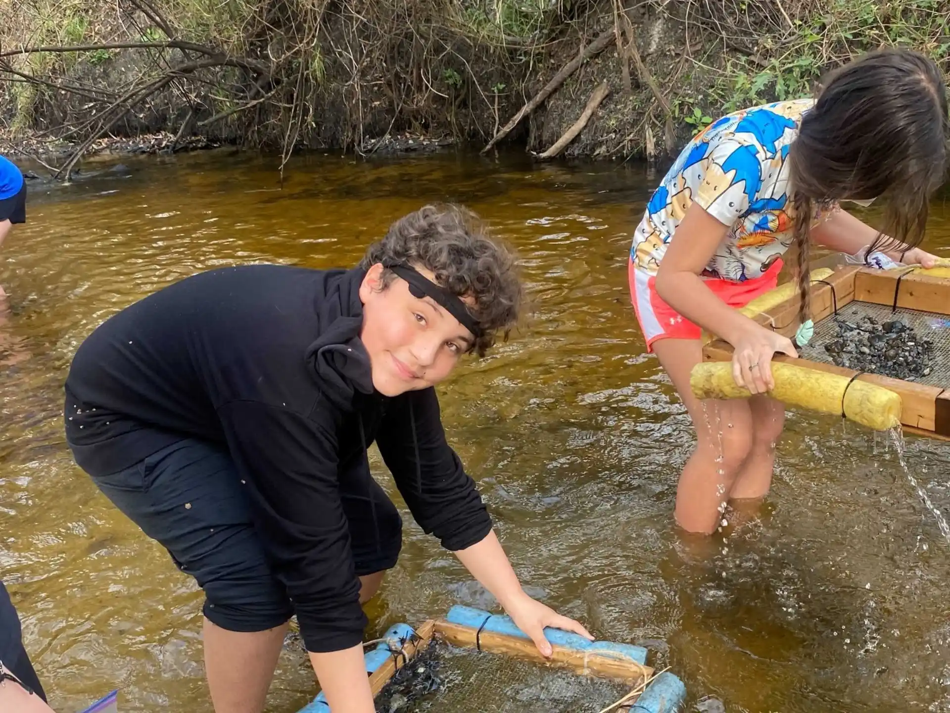 a man and a woman in a river