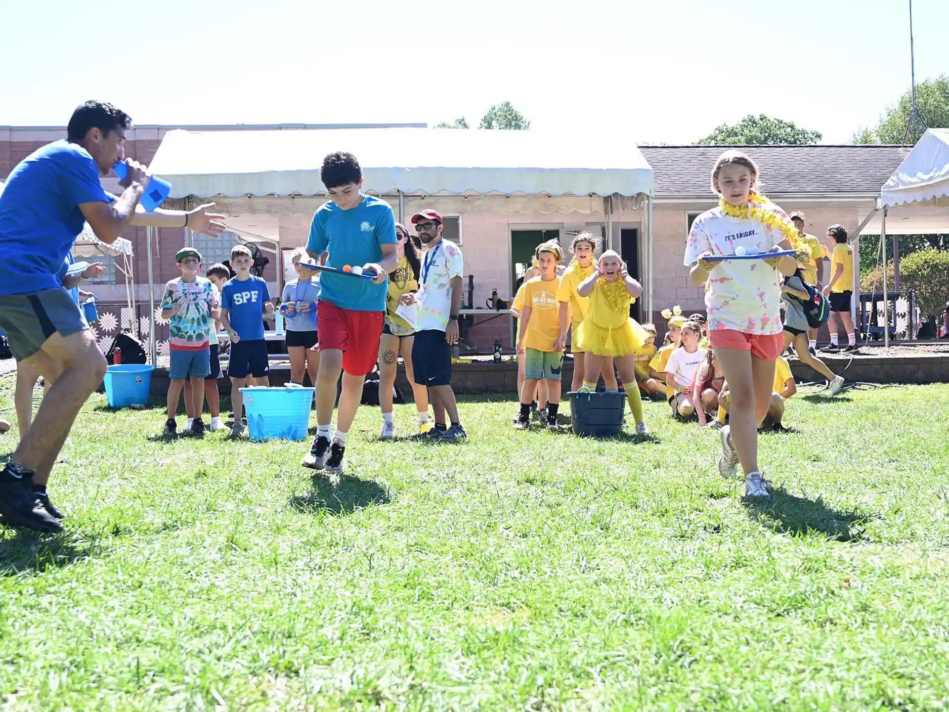 a group of people playing football