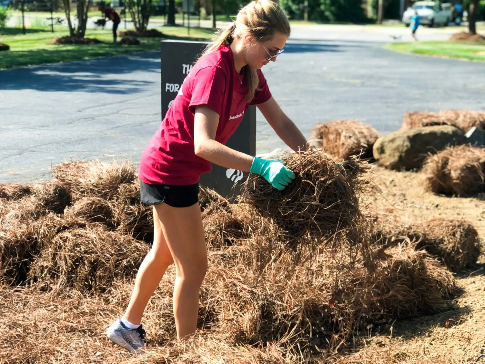 a woman digging in the dirt