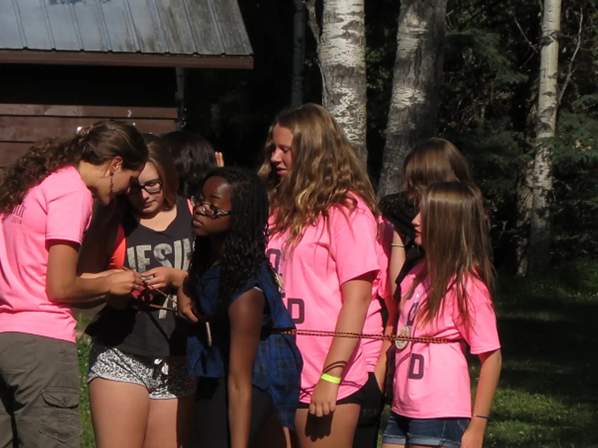 a group of people standing together outside