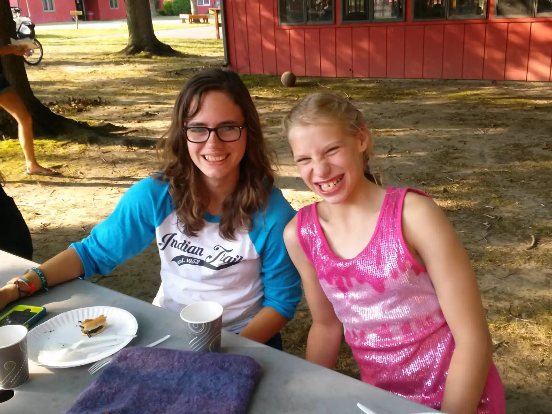 two women sitting at a table