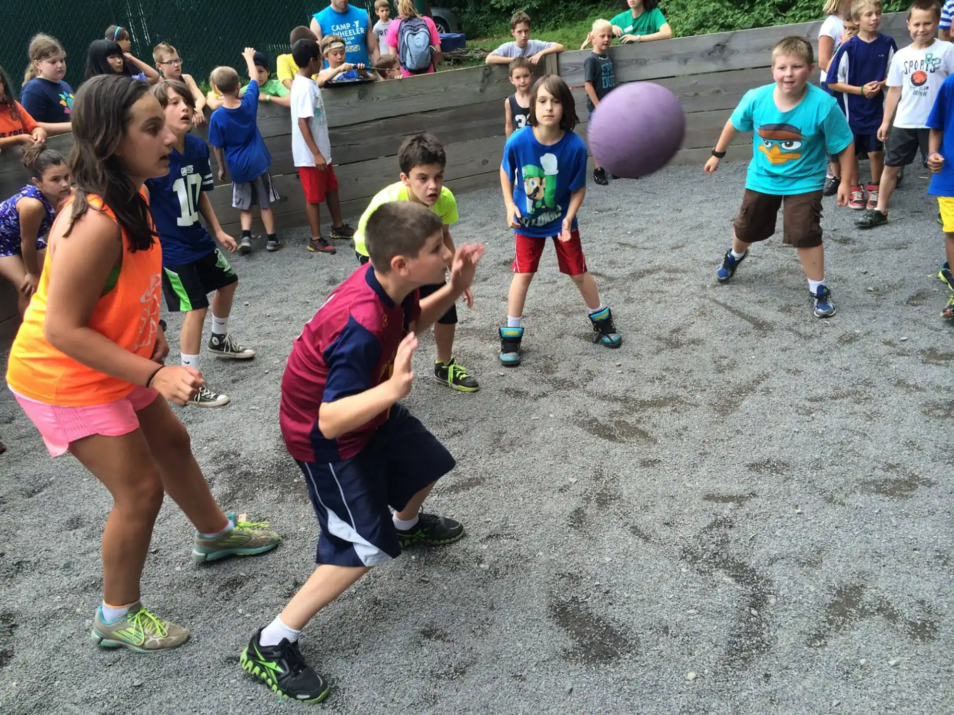 a group of children playing with a ball