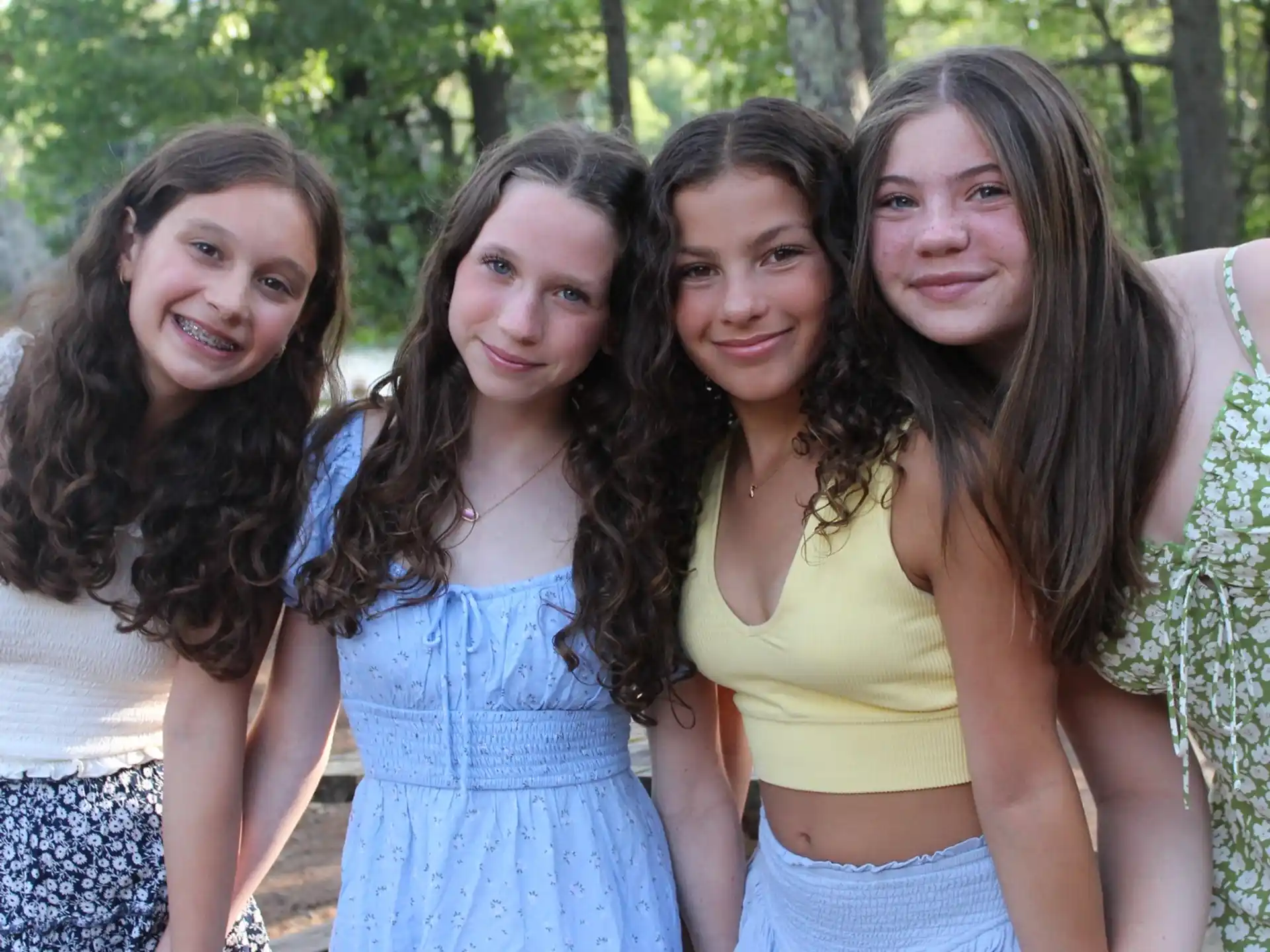 a group of women posing for a photo