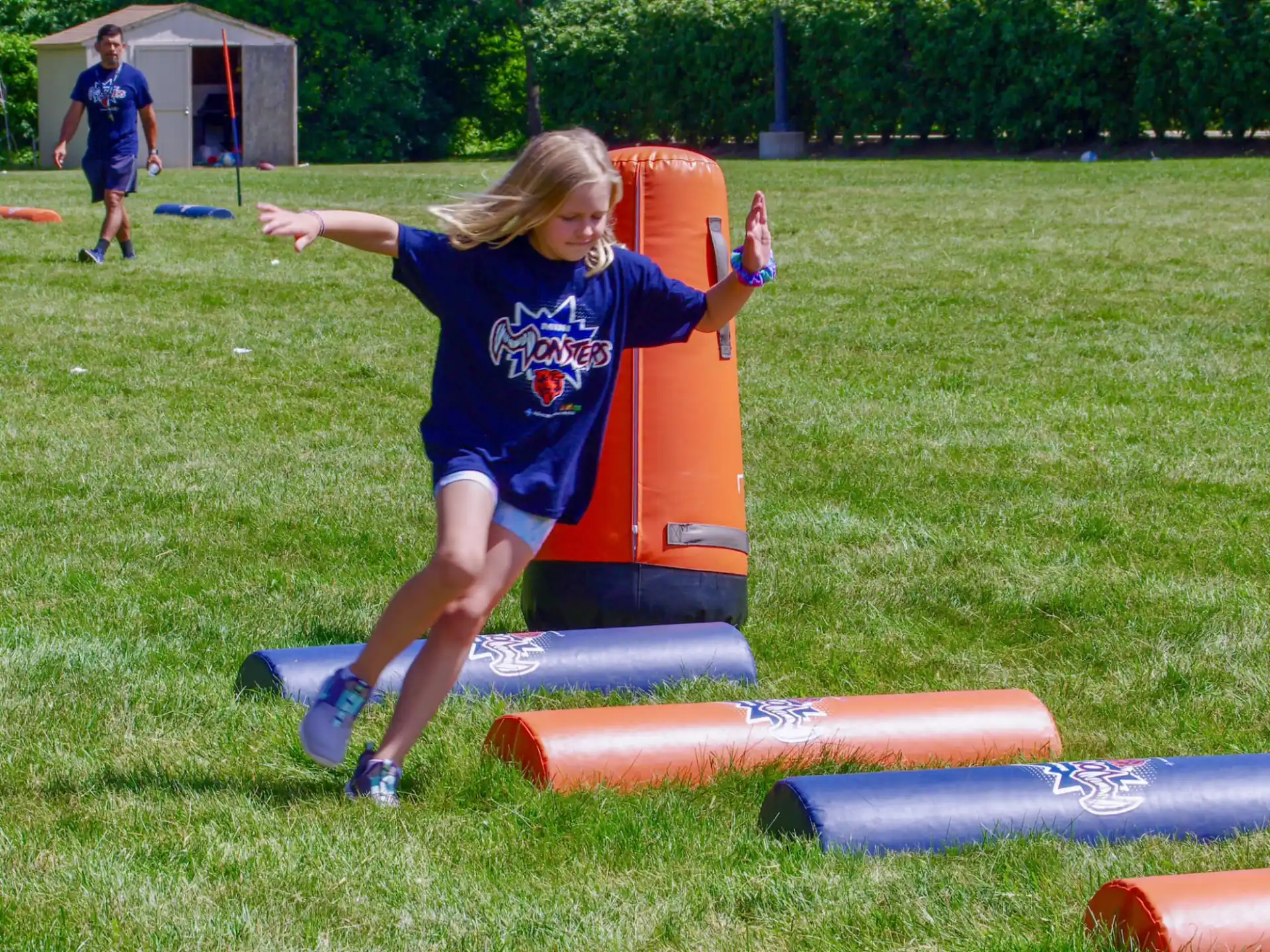 a girl playing on a playground