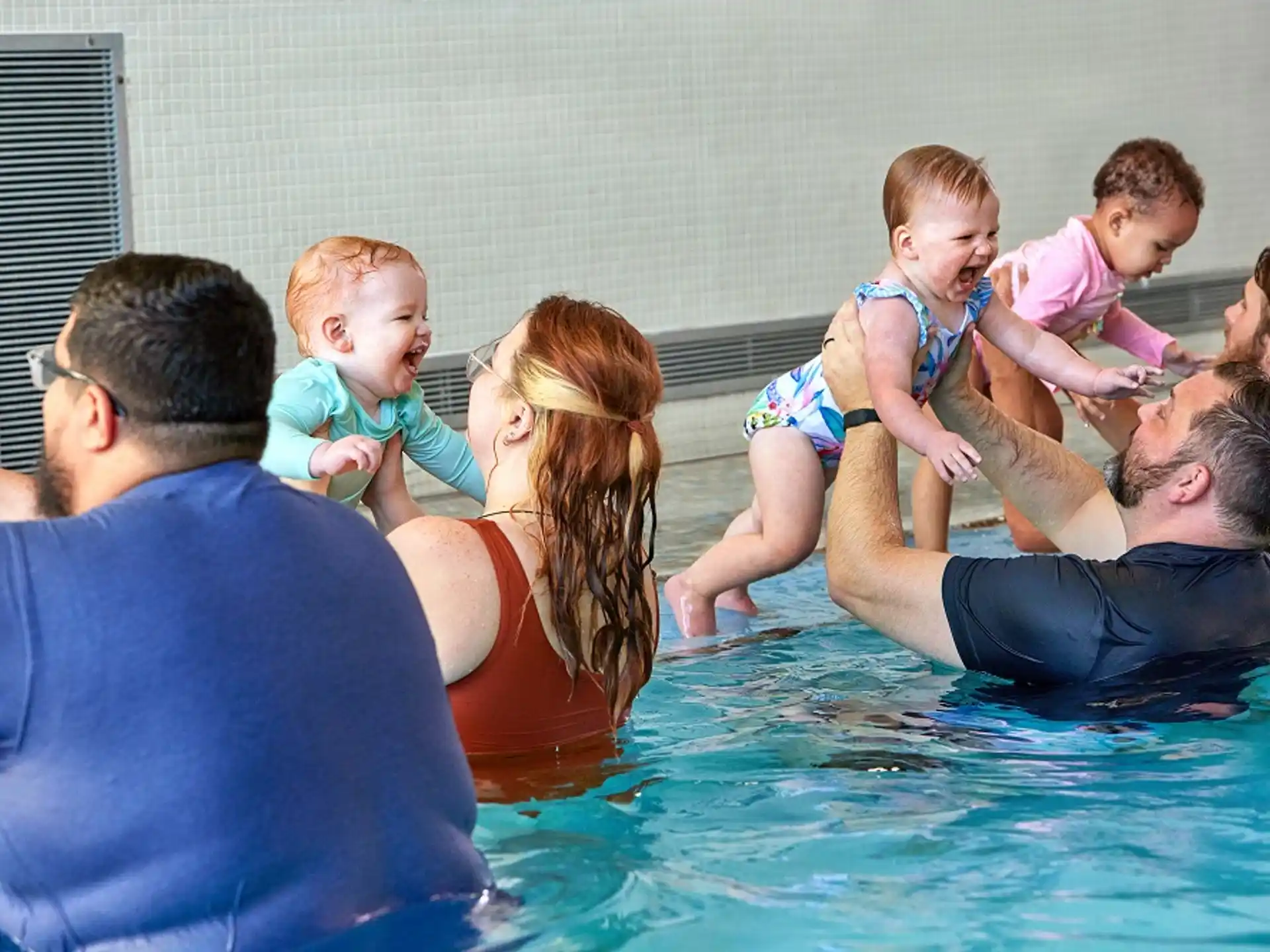 a group of people in a pool
