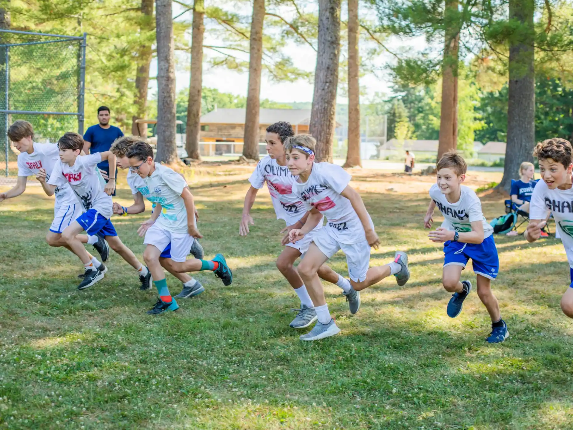 a group of kids playing rugby
