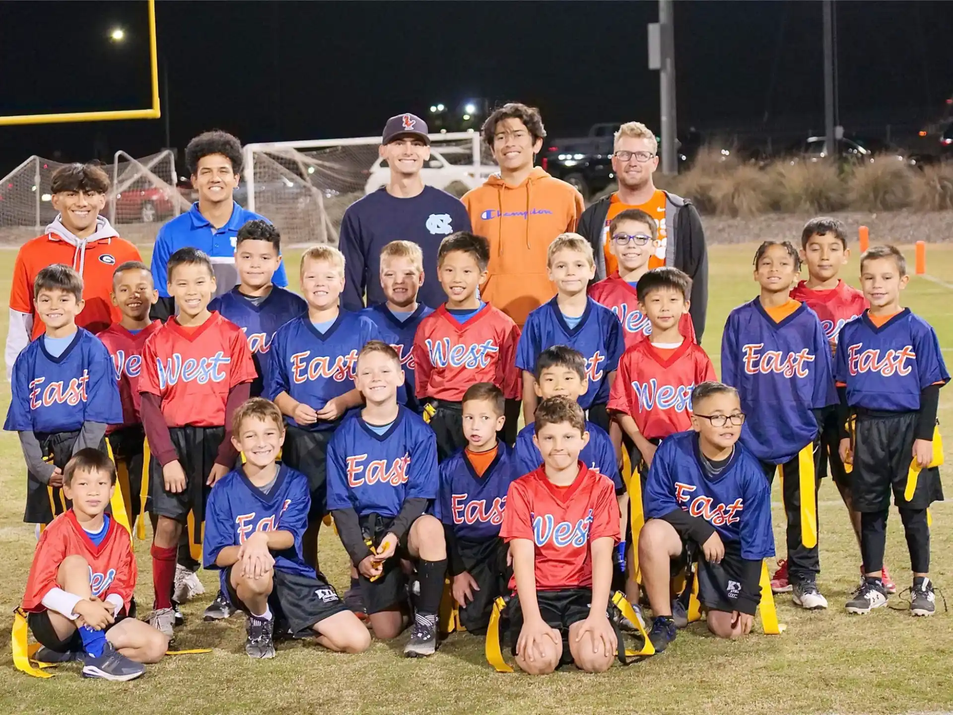 a group of people in sports uniforms