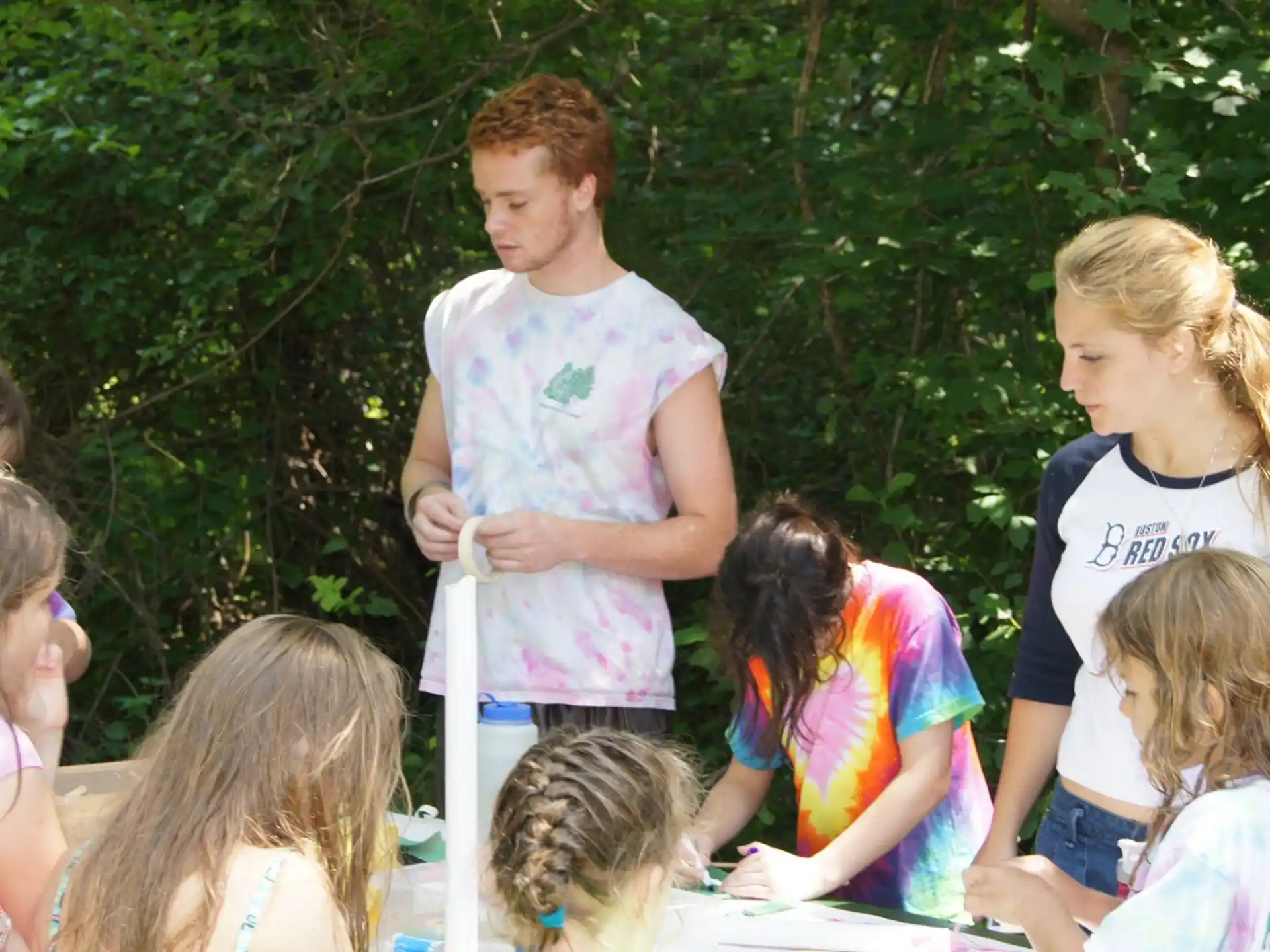 a group of children standing outside