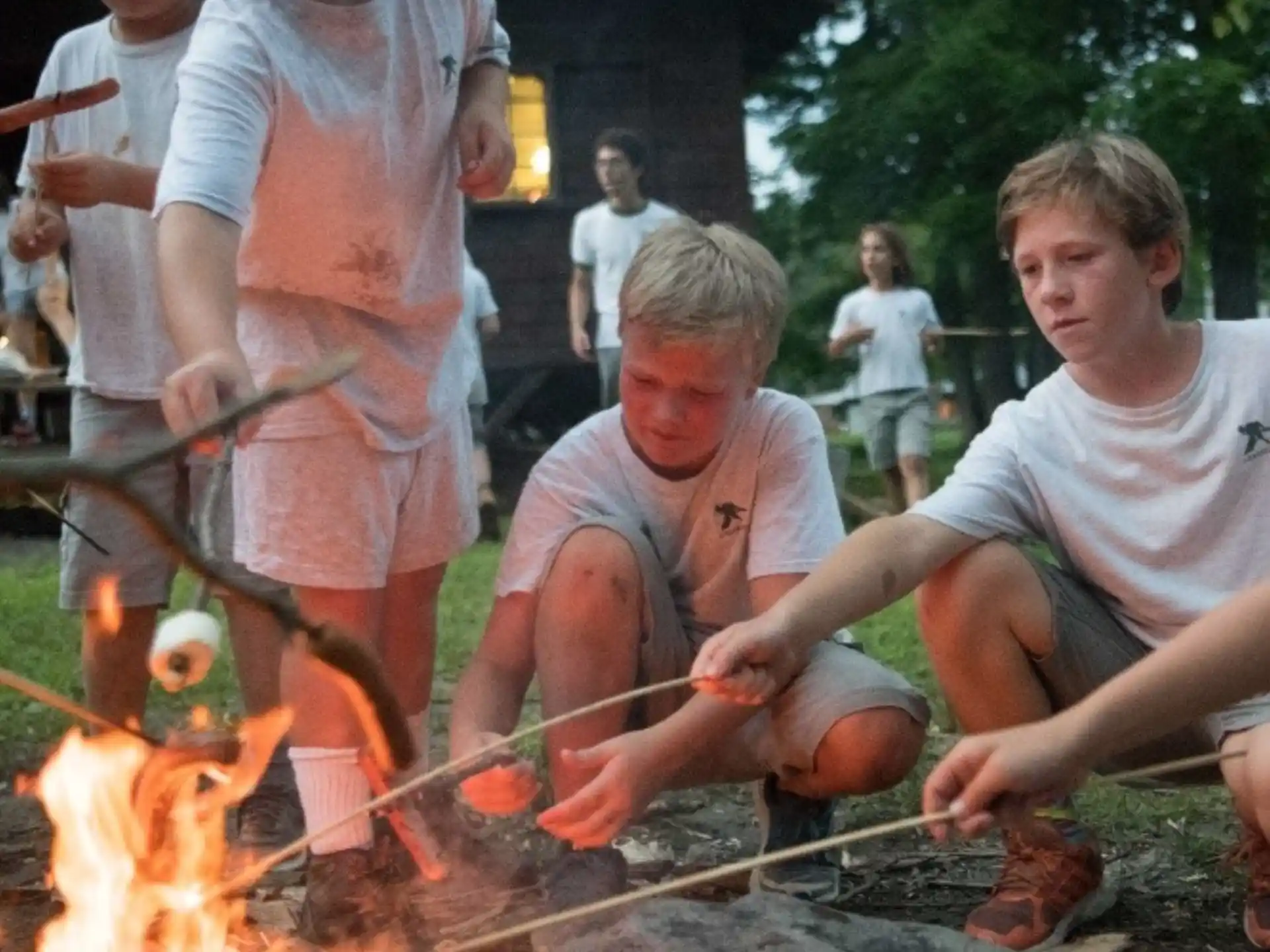 a group of people around a fire