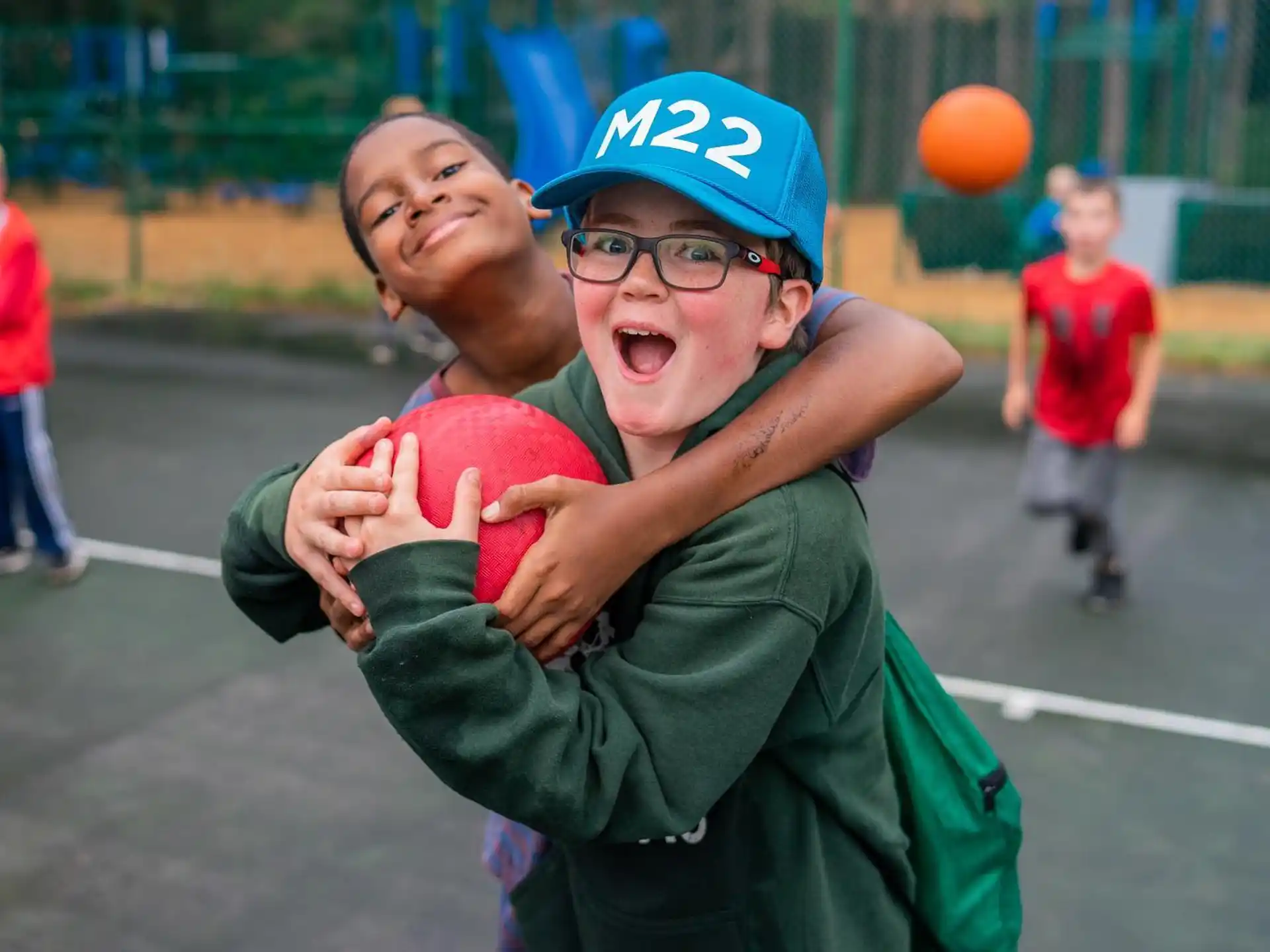 a person holding a boy