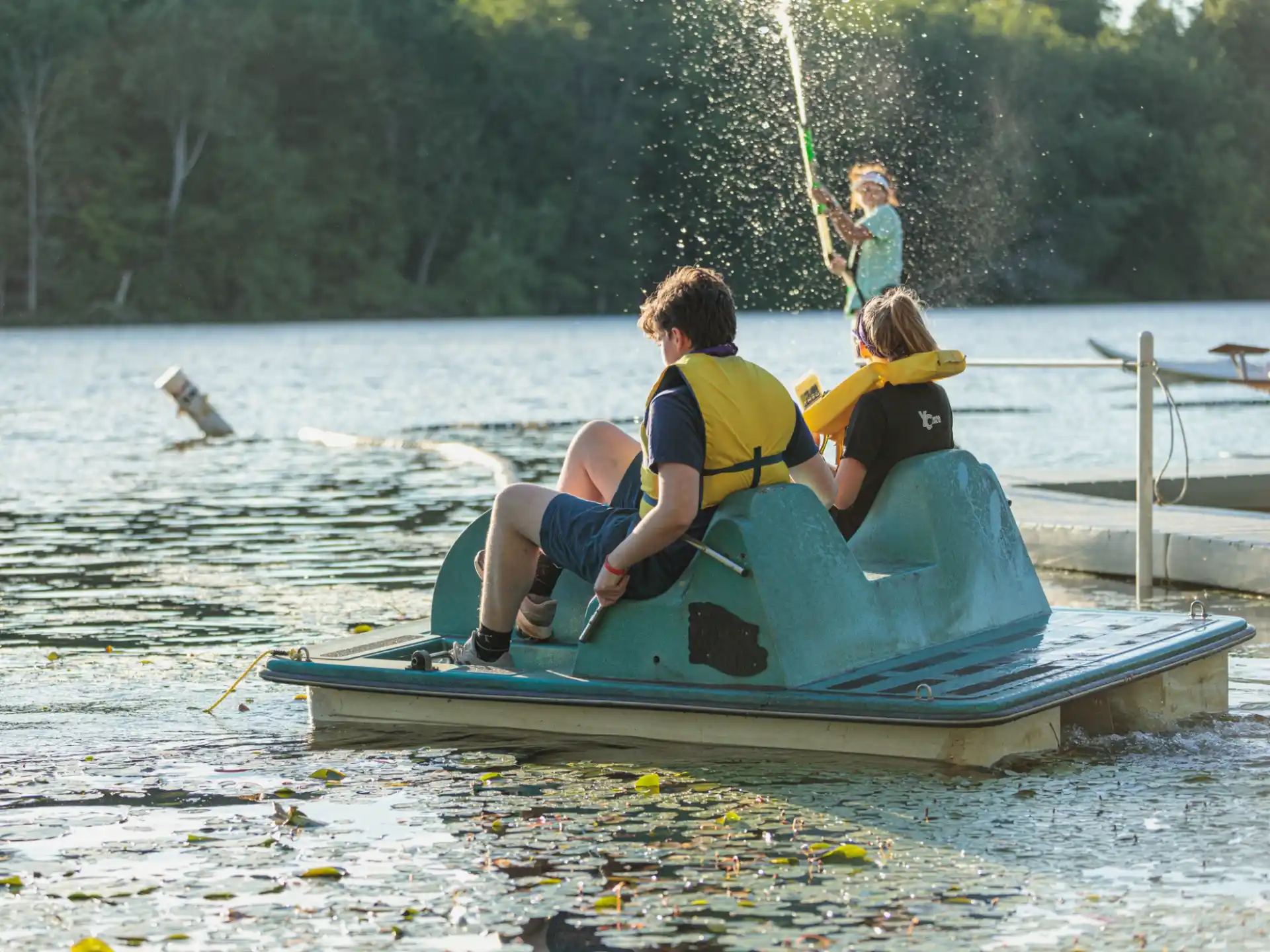 a group of people on a raft