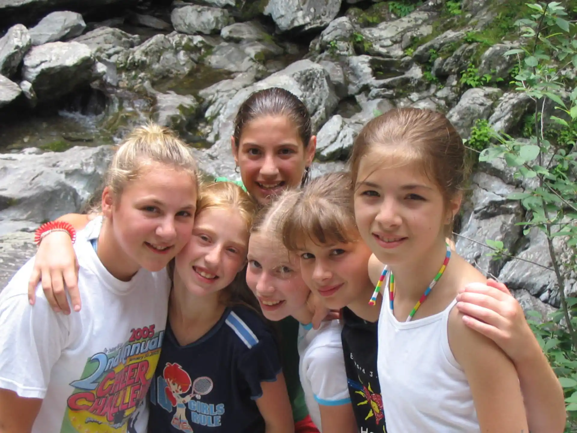 a group of children posing for a photo