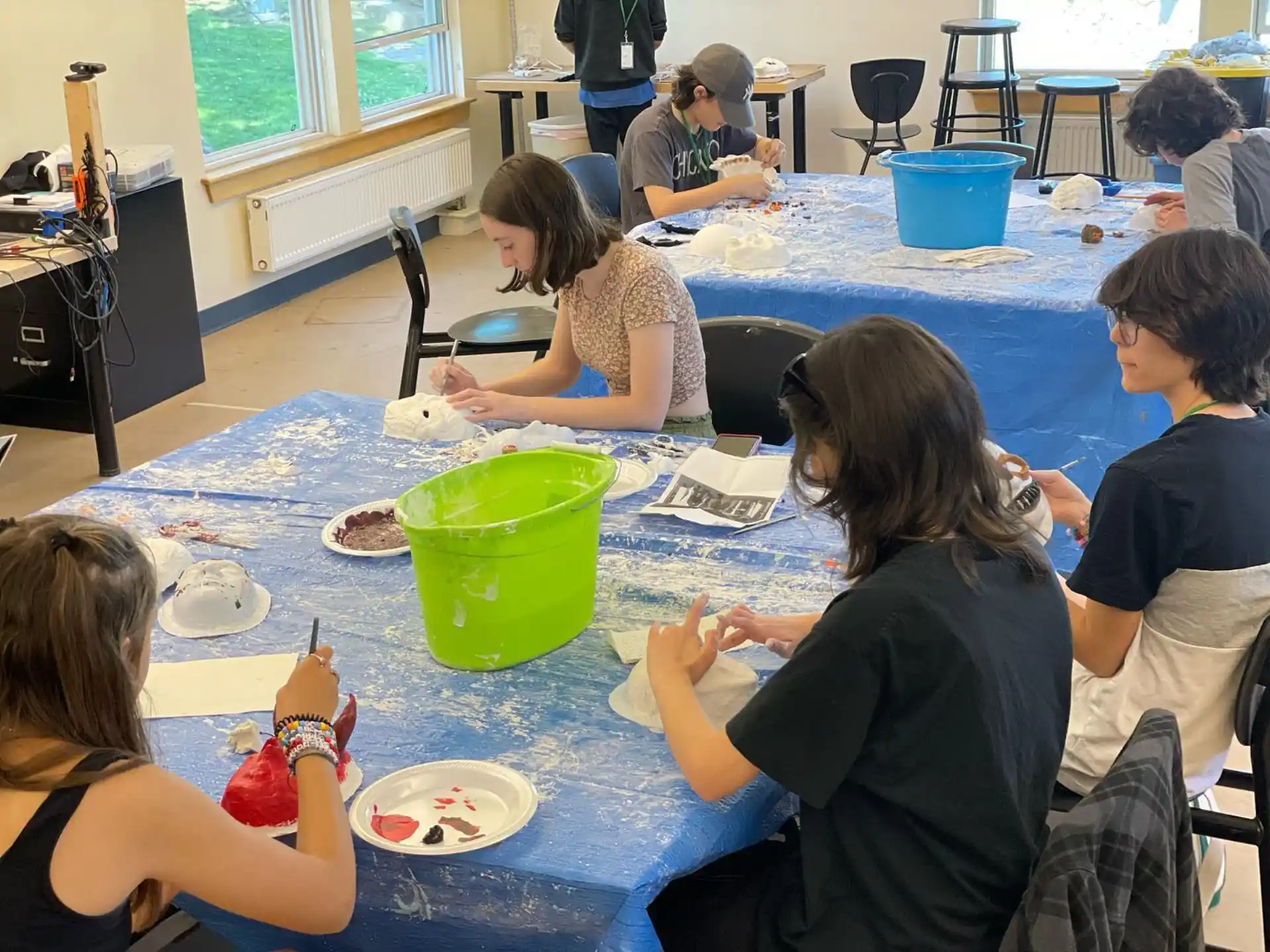 a group of people sitting around a table