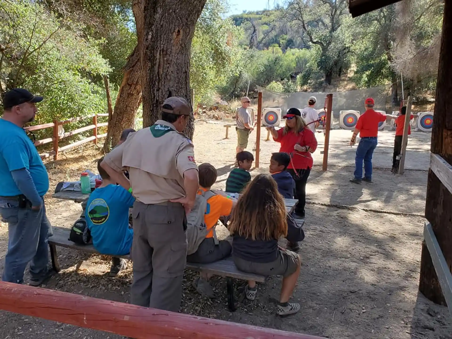 a group of people sitting on a bench